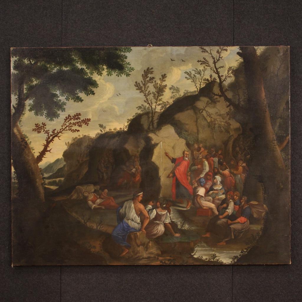 Antique Italian painting from the 18th century. Work oil on canvas depicting a religious subject Moses Drawing Water from the Rock of a good pictorial quality. Painting of great measure and impact, for antique dealers, interior decorators and