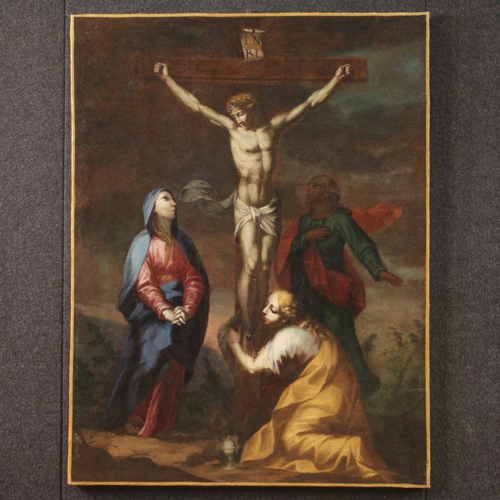 Antique Italian painting from the 18th century. Artwork oil on canvas depicting a religious subject Crucifixion with Madonna, Magdalena and Saint John of good pictorial quality. Nice size and pleasant impact painting characterized by a wise use of