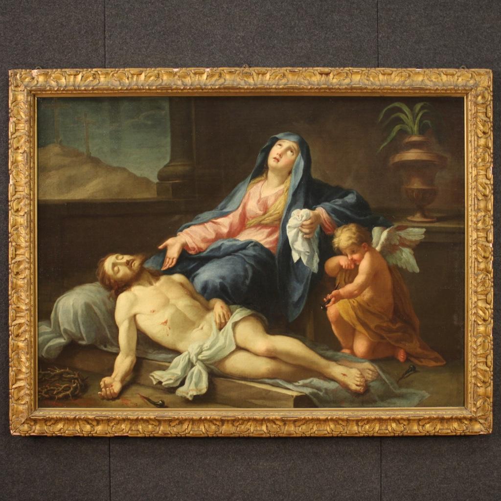 Italian painting from the second half of the 18th century. Framework oil on canvas depicting a religious subject Christ deposed with Virgin and little angel of good pictorial quality. Modern frame in wood and plaster, carved and gilded, with some