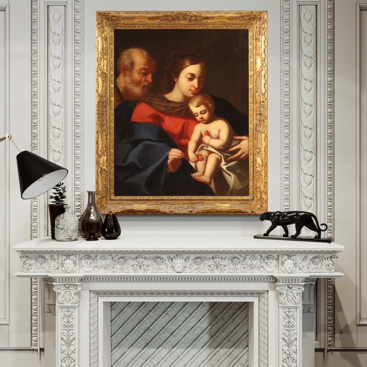 Antique Italian painting from the 18th century. Artwork oil on canvas depicting a religious subject, Holy Family of good pictorial quality. Painting adorned with a modern frame in wood and plaster, carved and gilded, of beautiful decoration.