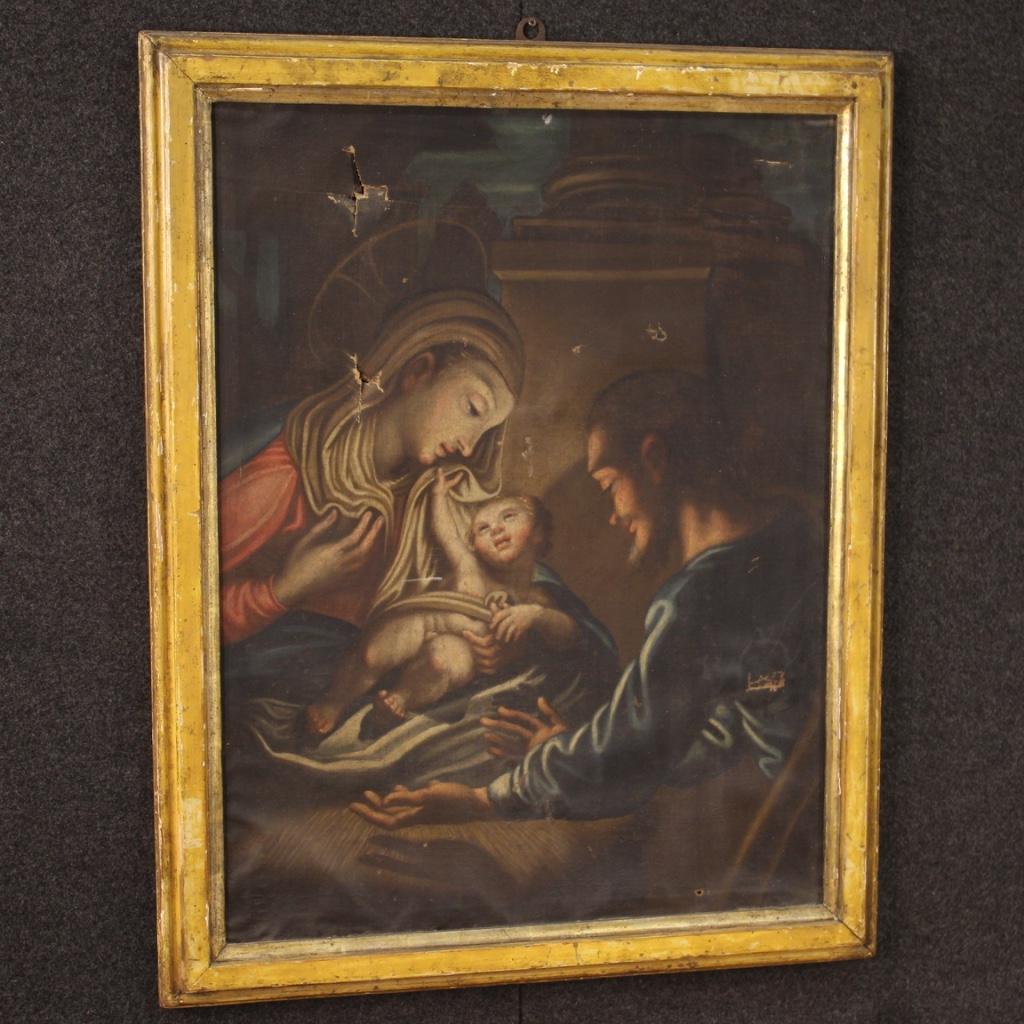 Antique Italian painting from 18th century. Framework oil on canvas in the first canvas depicting the Holy Family religious subject of good pictorial quality. Framework in beautiful patina with 19th century carved and lacquered frame of pleasant