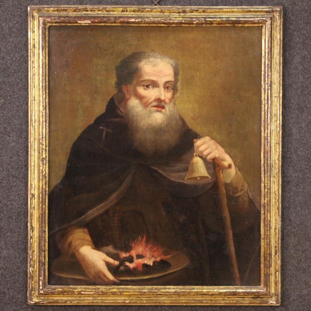 Ancient Italian painting from the 18th century. Framework oil on canvas depicting a religious subject Saint Anthony the Abbot of good pictorial quality. Antique wooden frame, not coeval, sculpted, restored and adapted to the painting during the 20th