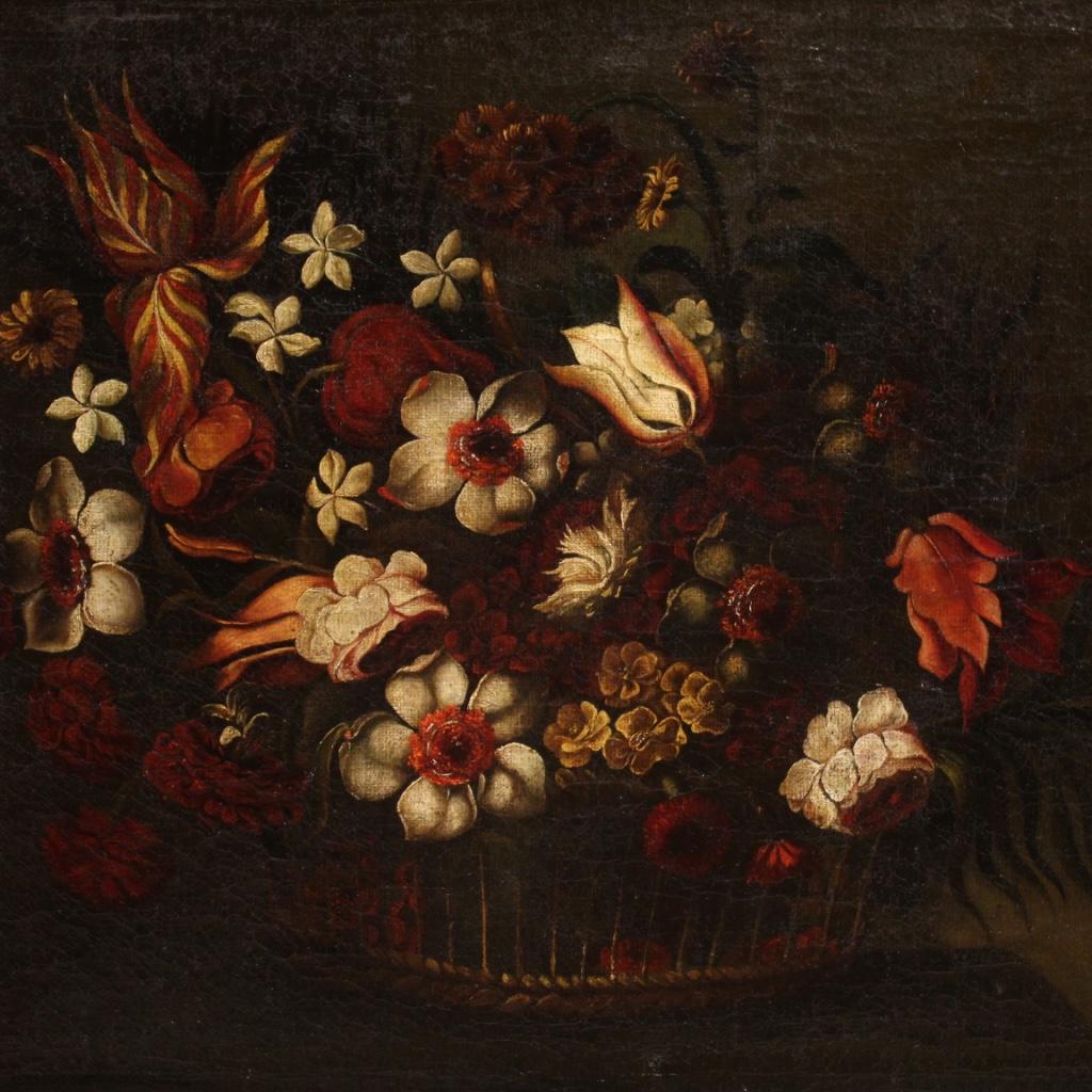 Fascinating Italian painting from the second half of the 18th century. Artwork oil on first canvas depicting a splendid still life with a basket of flowers, of great pictorial quality. Painting that has undergone a restoration and color recovery in