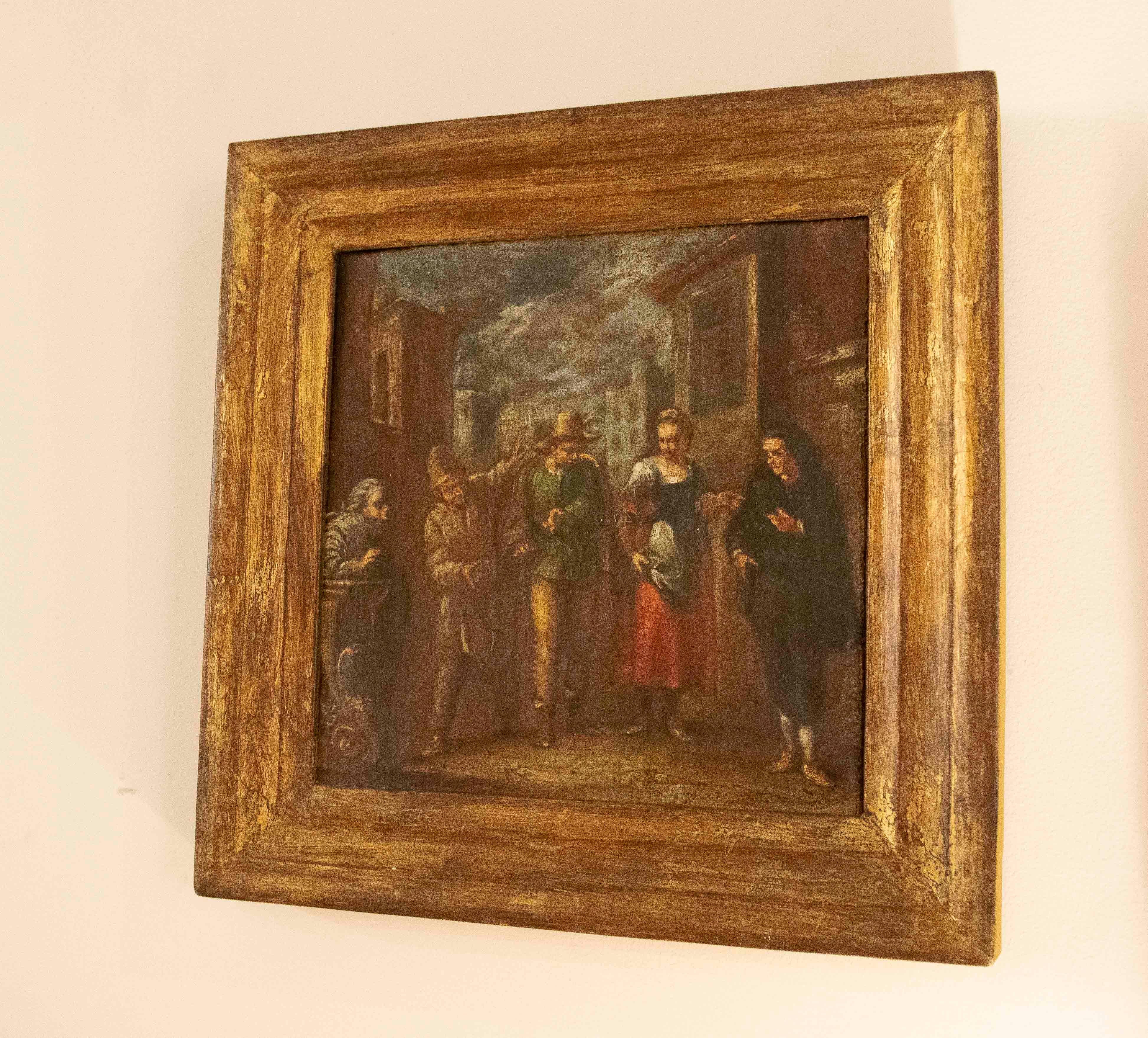 Gemälde mit Figuren in Öl auf Leinwand aus dem 18. Jahrhundert.  Das Gemälde stellt Figuren in einer alltäglichen Straßenszene dar, der Rahmen ist aus vergoldetem Holz, auf der Rückseite befindet sich eine Kuriosität, nämlich eine Krone und einige