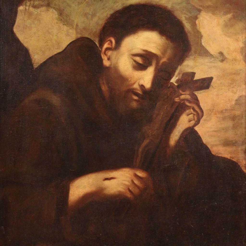 Antique Italian painting from the 18th century. Framework oil on canvas depicting a religious subject Saint Francis of good pictorial quality. 20th century frame, in wood and plaster, finely chiseled and gilded, fitted with a fabric passe-partout