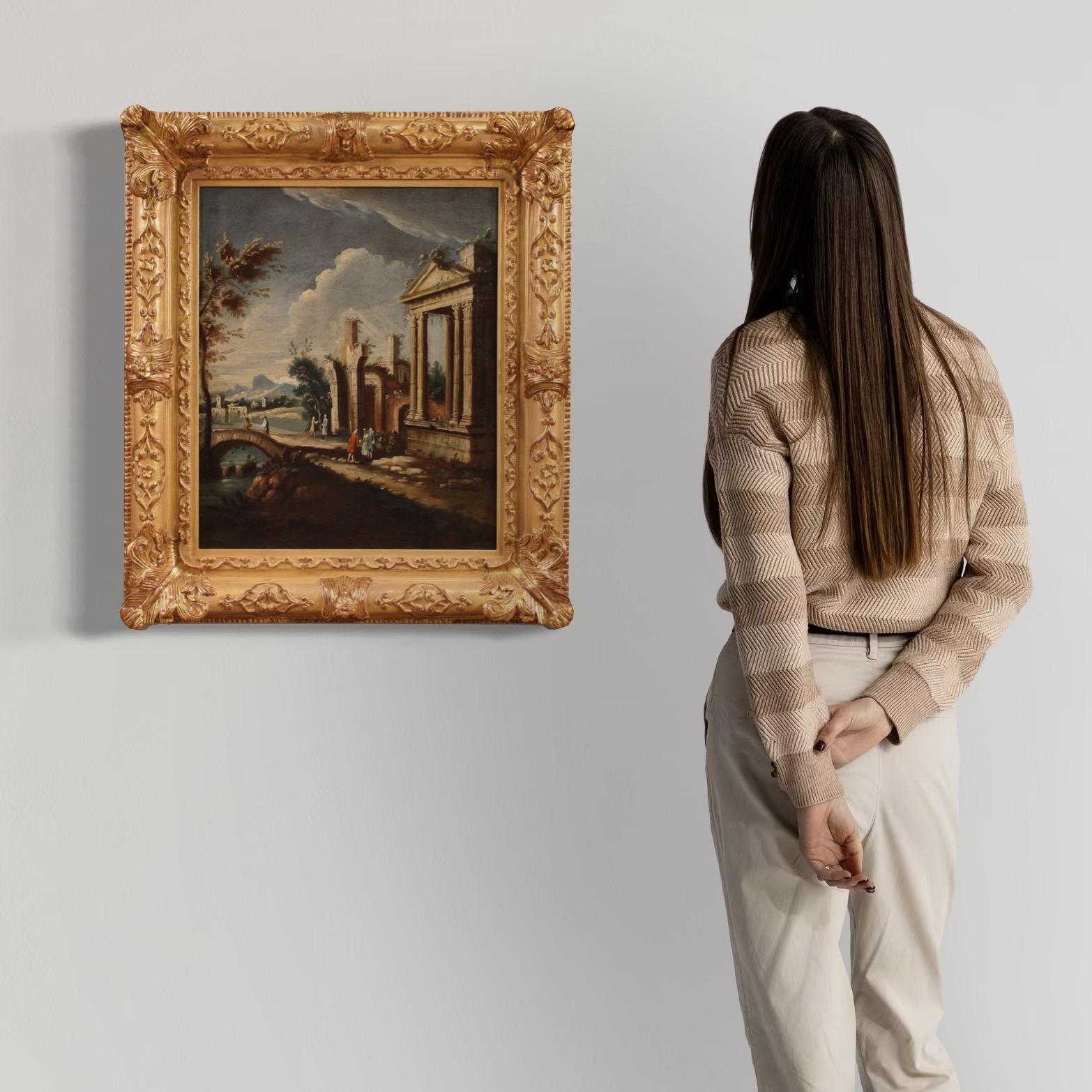 Refined Italian landscape from the second half of the 18th century. Oil painting on canvas depicting a splendid view with ancient ruins and figures in Venetian dress, of remarkable pictorial quality and rich in minute details. The artwork clearly