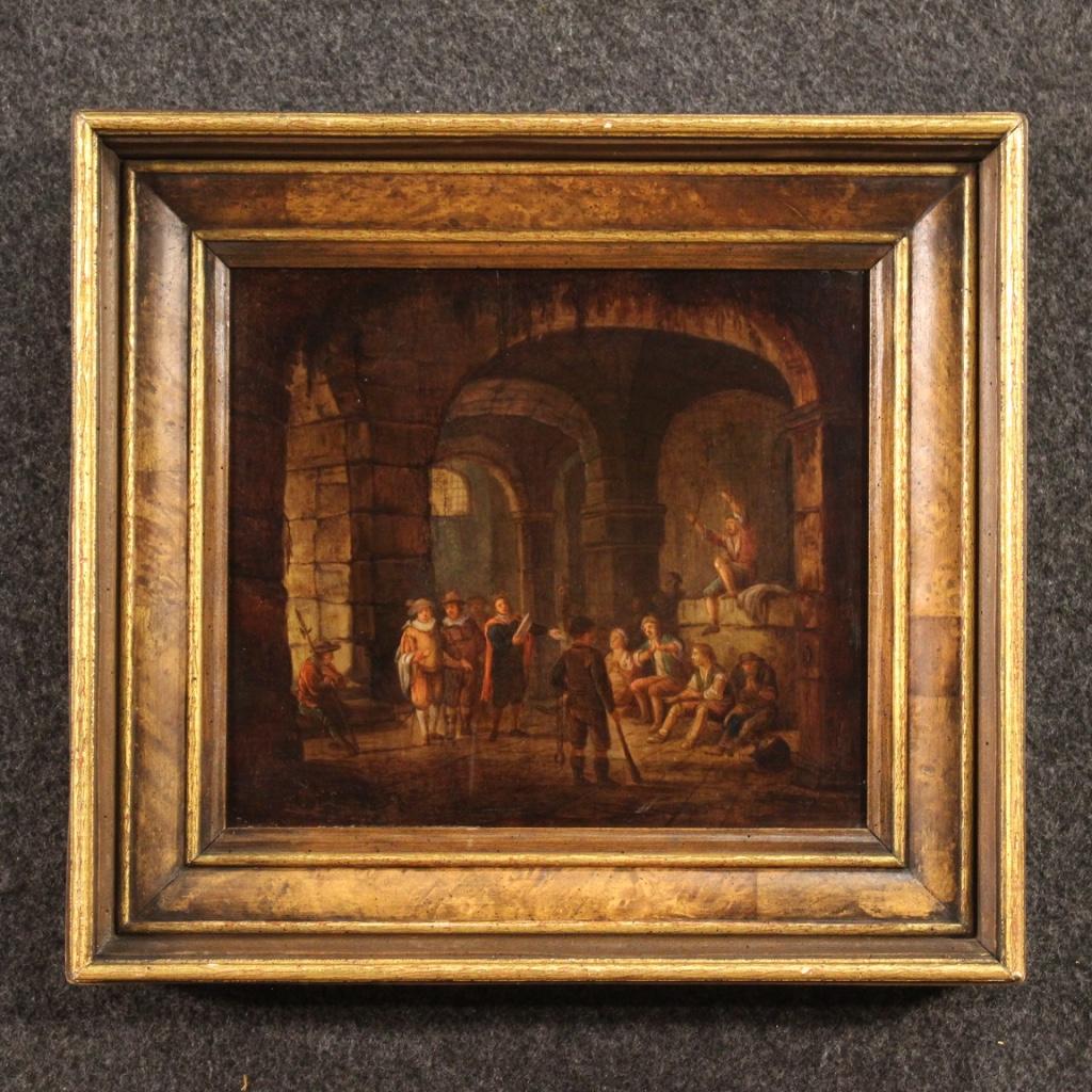 Antique Flemish painting from the late 18th century. Oil on panel framework, of limited size, depicting an interior scene, Prison with characters of good pictorial quality. Modern wooden frame carved with gilding decorations (see photo) of beautiful