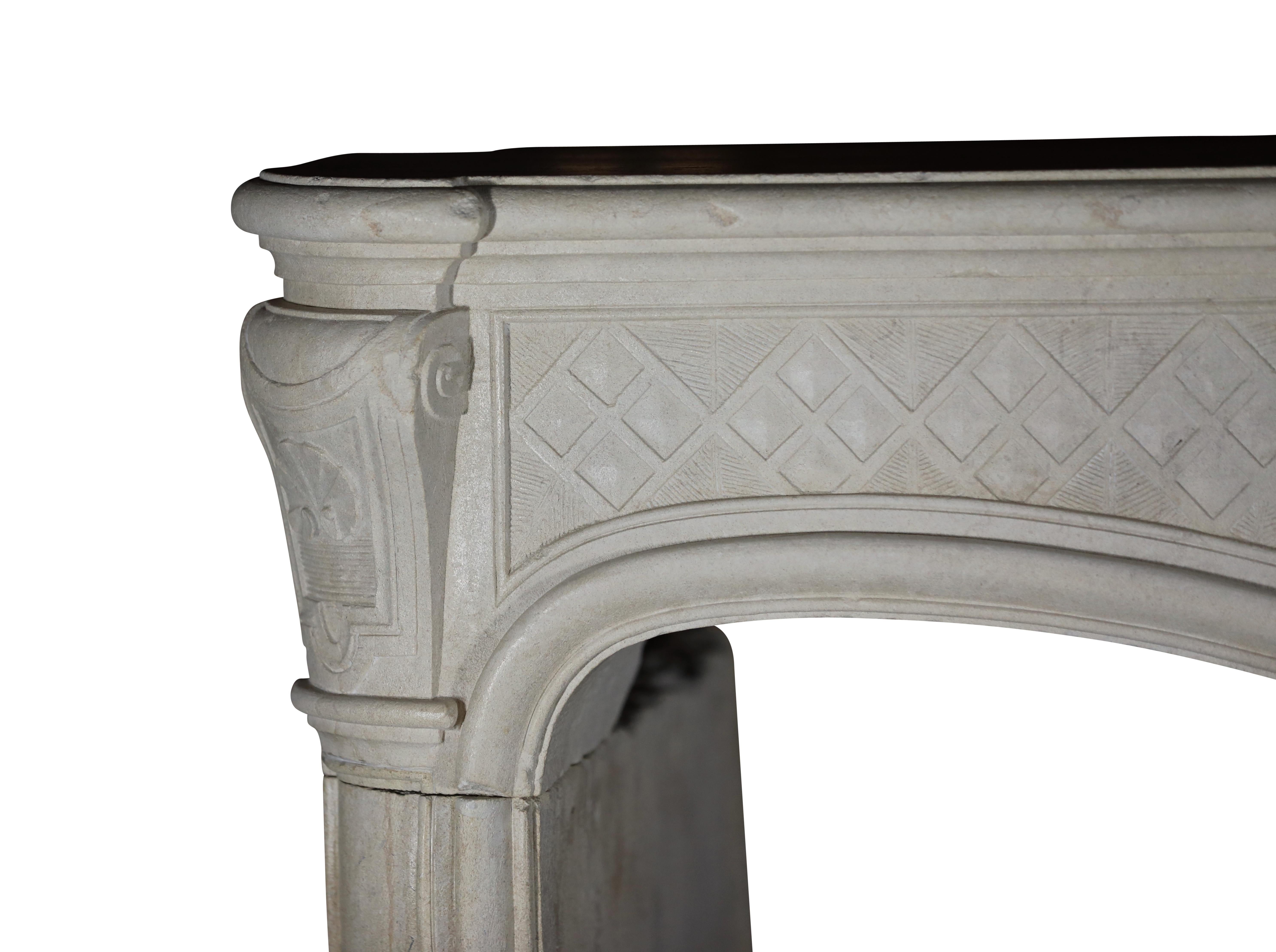 Carved 18th Century Original Antique Fireplace in Limestone For Sale