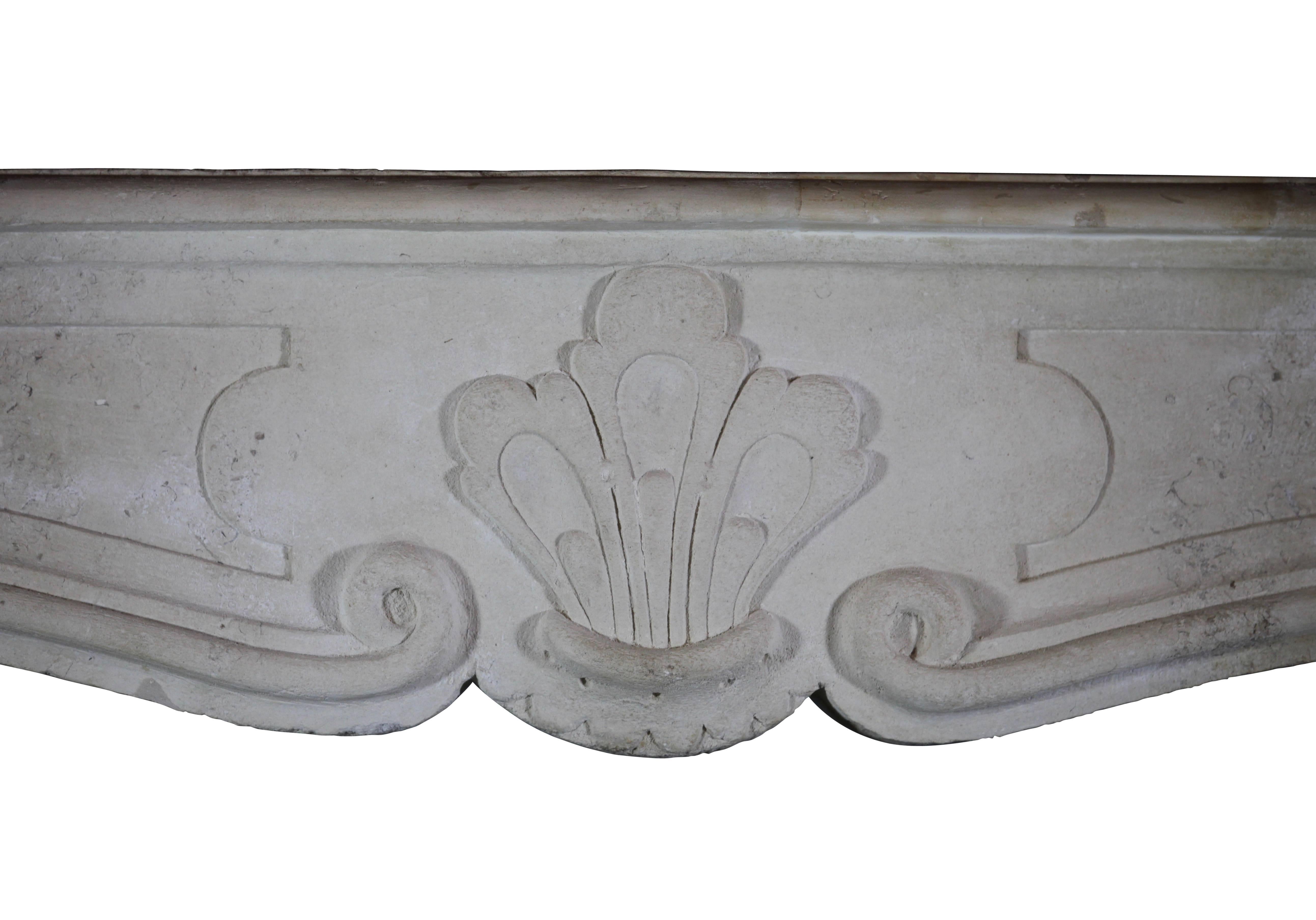 Original Louis XIV fireplace surround in limestone with nice curves. The jambs are unusual expressive. This is a rather clean element however underwent some restorations.
Measures:
174 cm EW 68.50