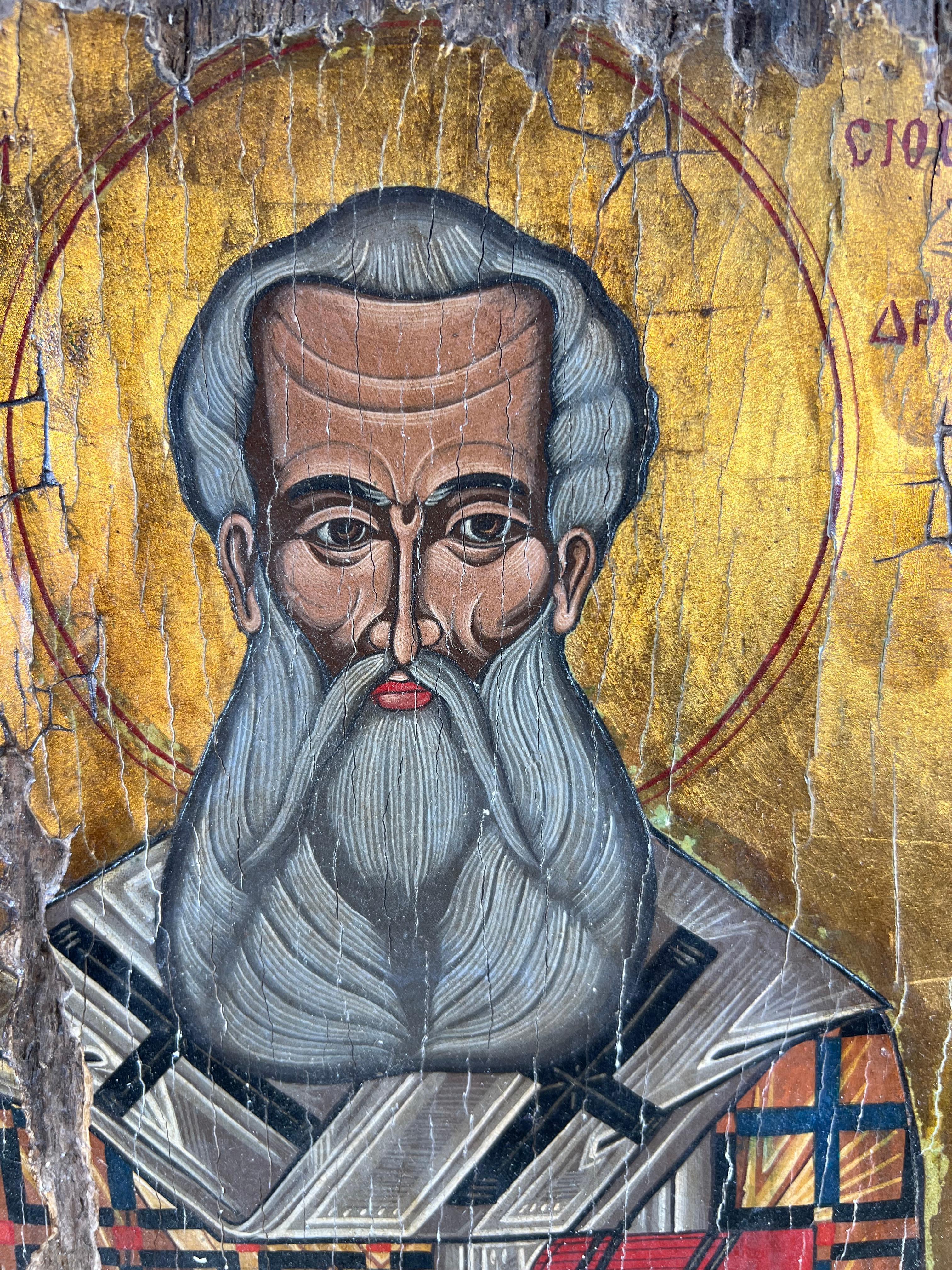 A stunning 18th-century Orthodox icon depicting Saint Athanasius of Alexandria, an important Patriarch and Church Father. This religious artwork is hand-painted on a solid wooden panel with a gold leaf background, following the traditional Byzantine