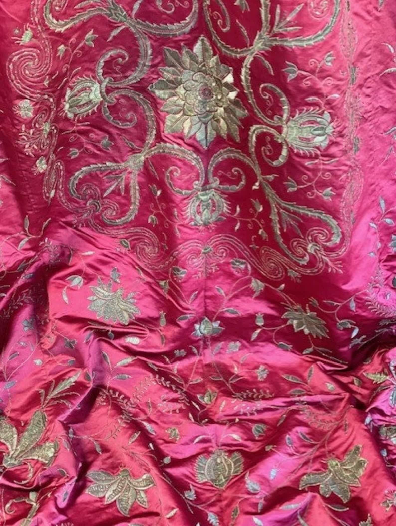  Magnificent Antique Ottoman Cover

Finest quality Dark Pinky Red silk (some photos make it look too pink)

Hand embroidered throughout with exceptional quality Gold and Silver metallic needlework
Featuring exotic Flowers and Pomegranates
Finished