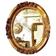 18th Century Oval Gilded Mirror with Carved Roses