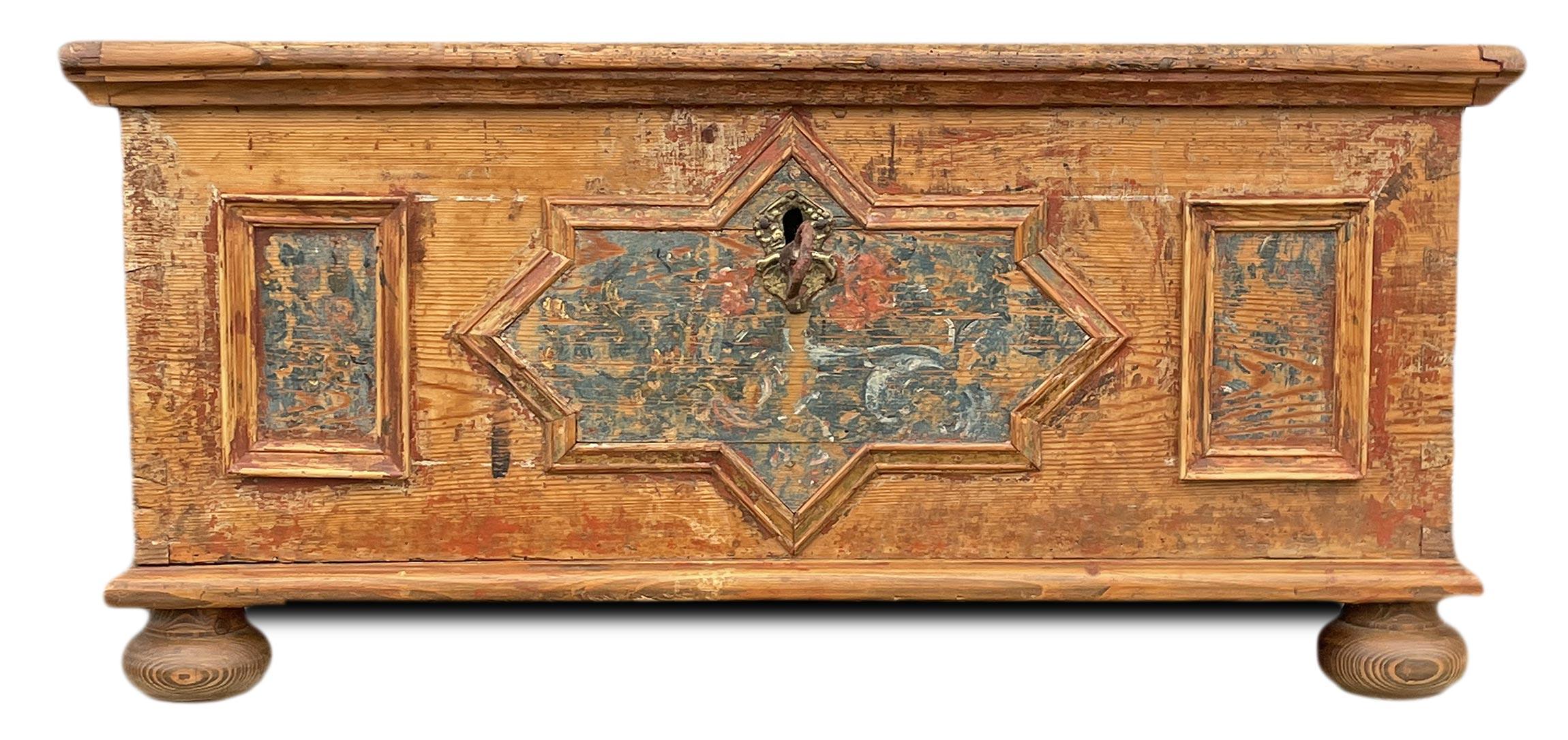 Alpine Painted Chest

Measurements: H. 38 cm – W. 82 cm – D. 46 cm
Period: circa 1780
Origin: Tyrol
Wood: Fir

Description:
Small Tyrolean chest, entirely made of fir wood, with ramages decorations.
There are three framed panels on the front. The