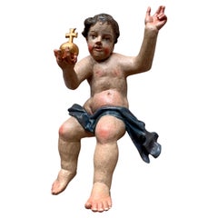 Sculpture d'enfant Jésus peinte et sculptée du 18ème siècle