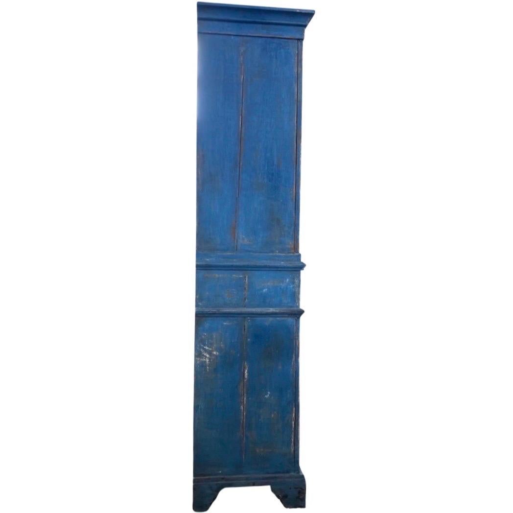 One of a kind painted deux corps cabinet made in the Netherlands in the late 1700s using oak and pegged construction. This is an absolutely stunning piece that draws attention to itself, without being ostentatious. The cupboard is composed of two