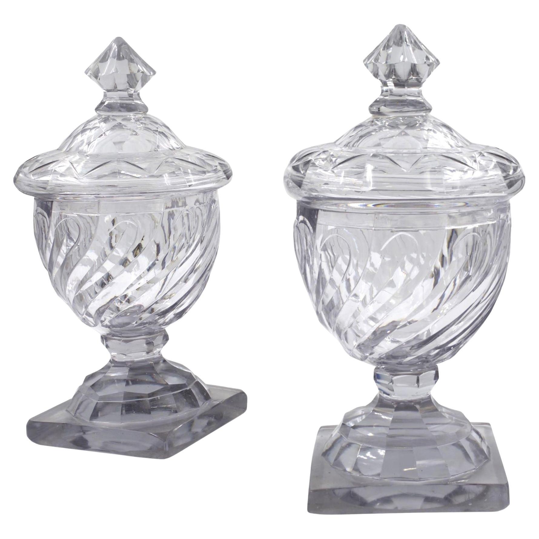18th Century Pair of English Georgian Cut Swirled Glass Urns with Dome Lids For Sale