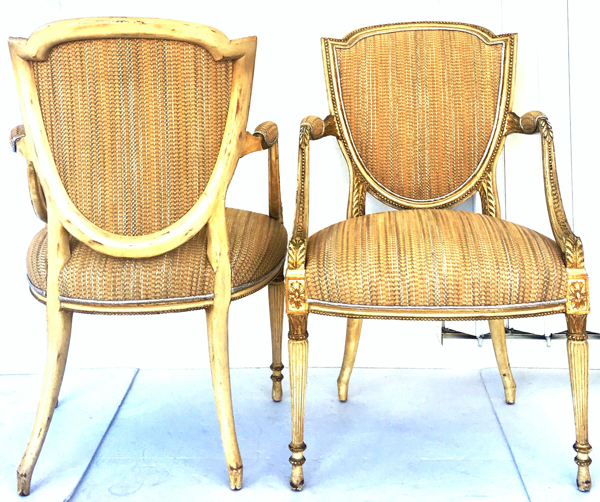 18th century antique fine pair of French Louis XVI Jean Baptiste Claude Sene style, shield back hand carved gilt wood and woven leather upholstered armchairs. Finely crafted chair frames in the manner of Jean Baptiste Clause, hand carved and painted