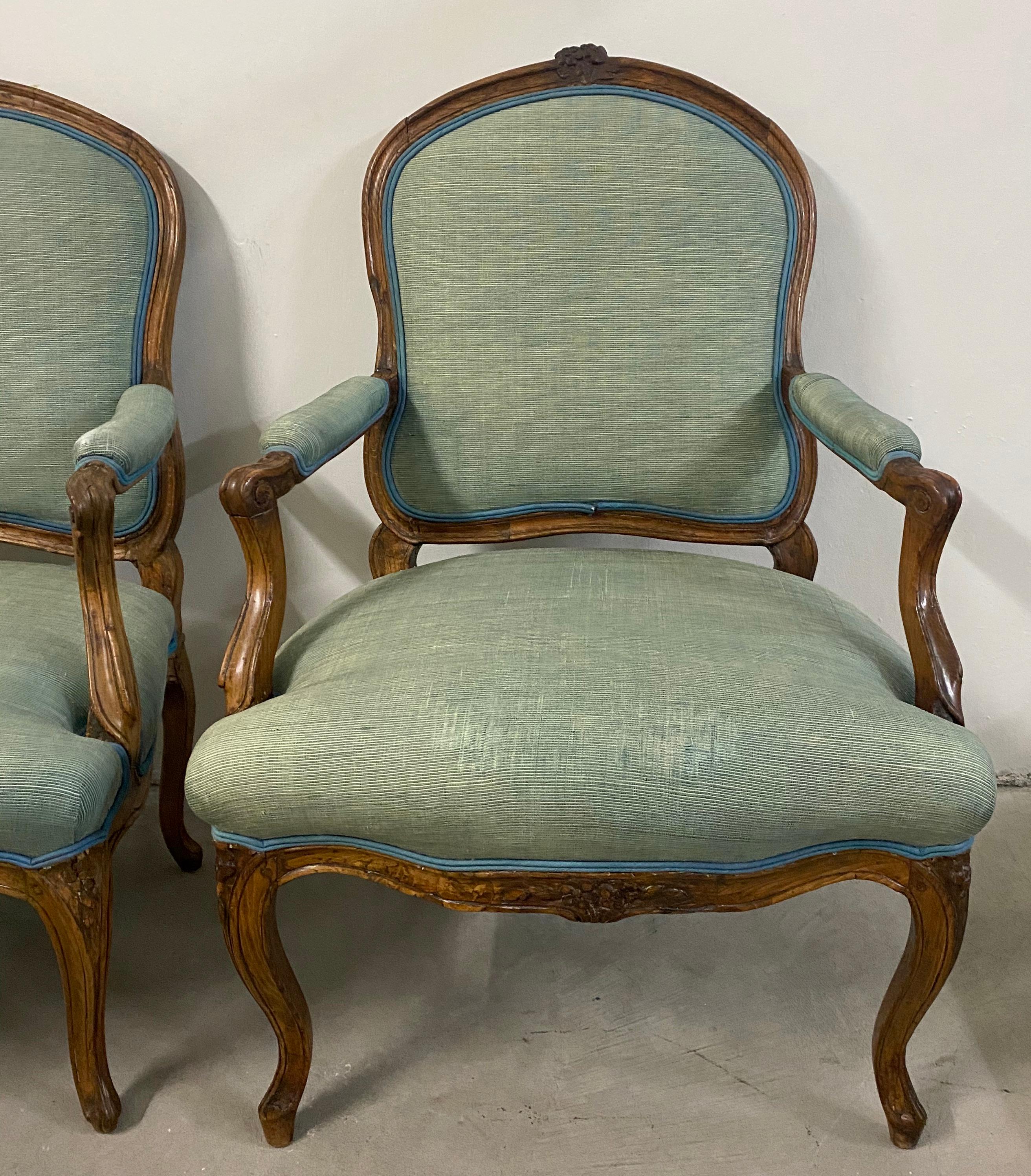 18th century pair of French Louis XV carved walnut armchairs

The chairs currently have a lightly distressed green linen fabric. Easily replaced.

Measures: 26
