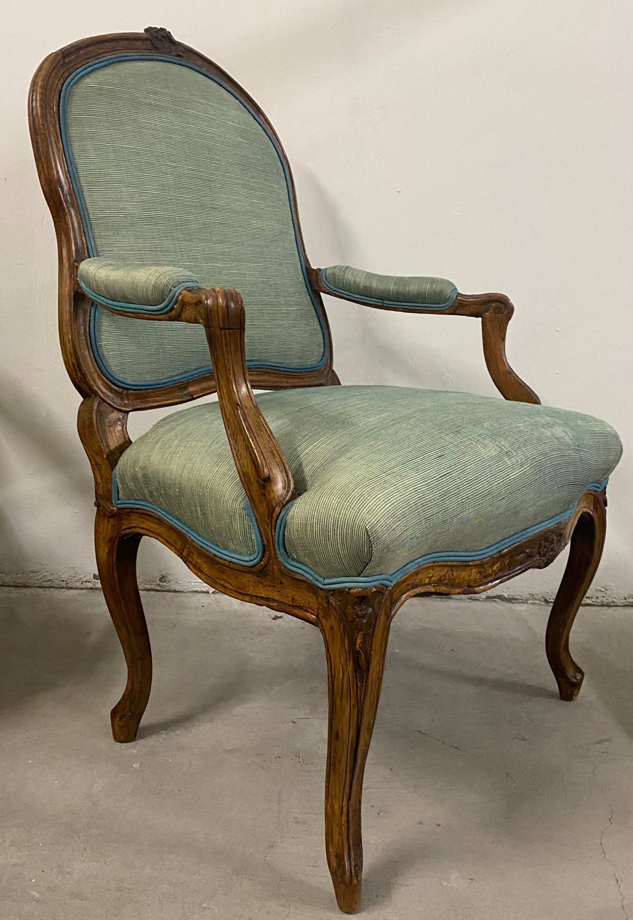 Hand-Carved 18th Century Pair of French Louis XV Carved Walnut Armchairs For Sale