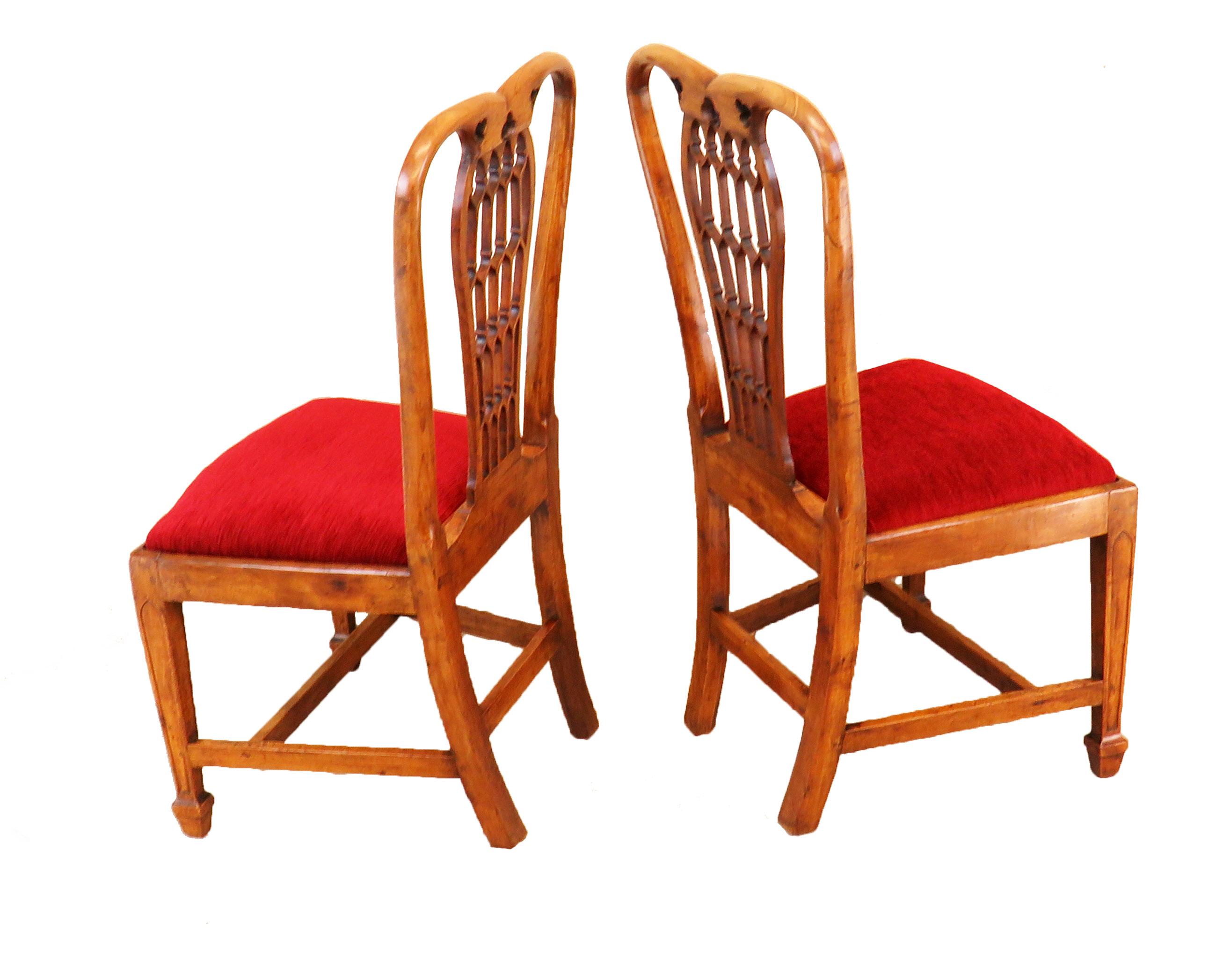 A charming pair of 18th century English fruitwood.
Side chairs having delightful lattice pattern pierced.
Fretwork backs over shaped drop in seats raised on.
Elegant square tapering legs with moulded.
Decoration and h stretcher.

(The backs of