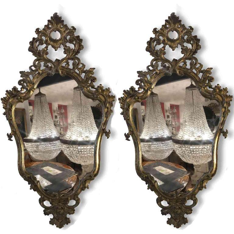 Italian pair of 18th century Louis XV style carved mecca mirrors, a pair of silver-leaf with mecca finish carved frames, lovely scrolling, floral and vegetal Louis XV carving, with mercury glasses, one is broken in the lower part, see closed-up