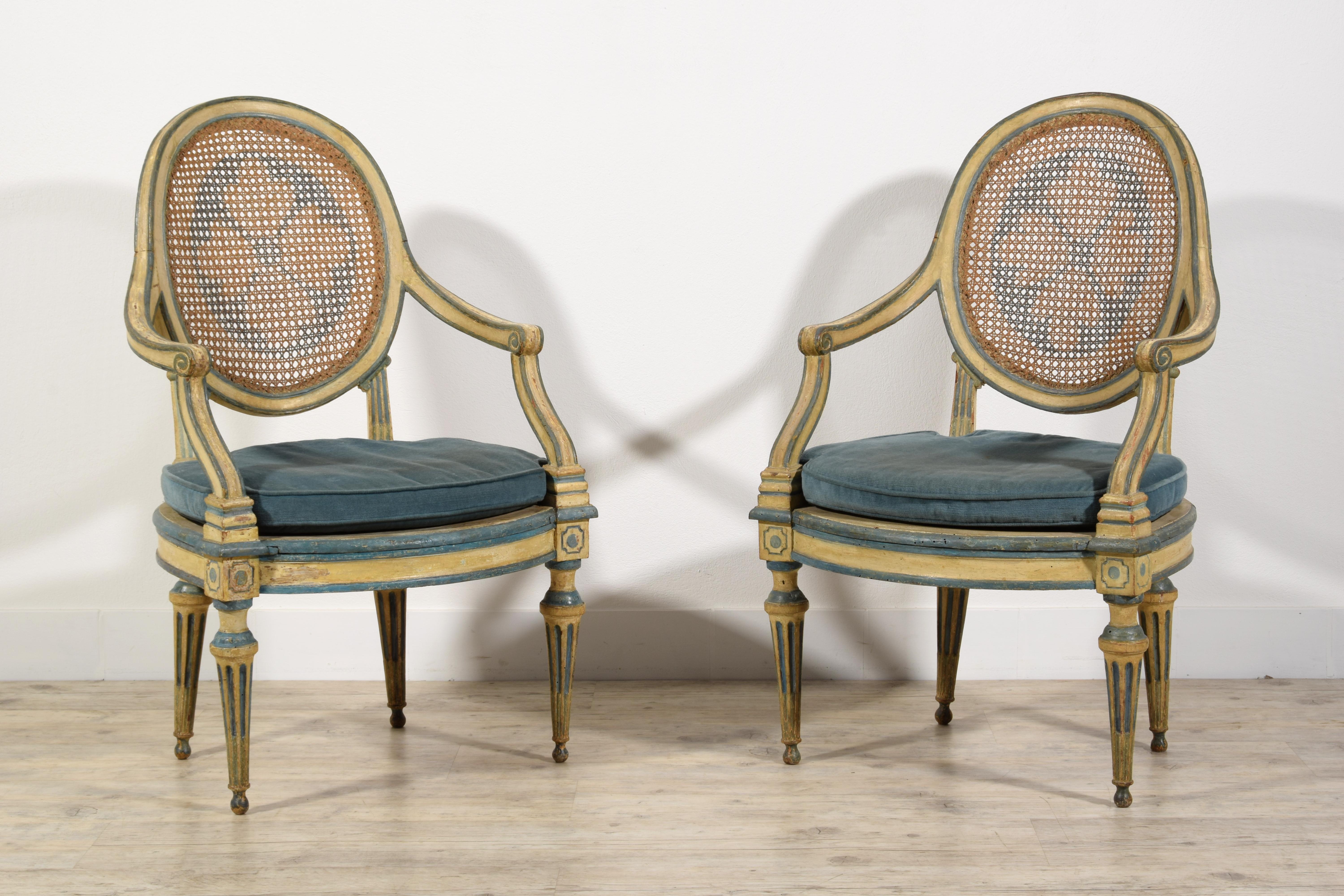 18th Century pair of Italian Neoclassical Lacquered wood armchairs. 
Measurements: cm H 108 x W 73 x D 77, seat cm H 46 x D 51 x W 61.
This elegant pair of neoclassical armchairs was made in Genoa, Italy, towards the end of the 18th century. The