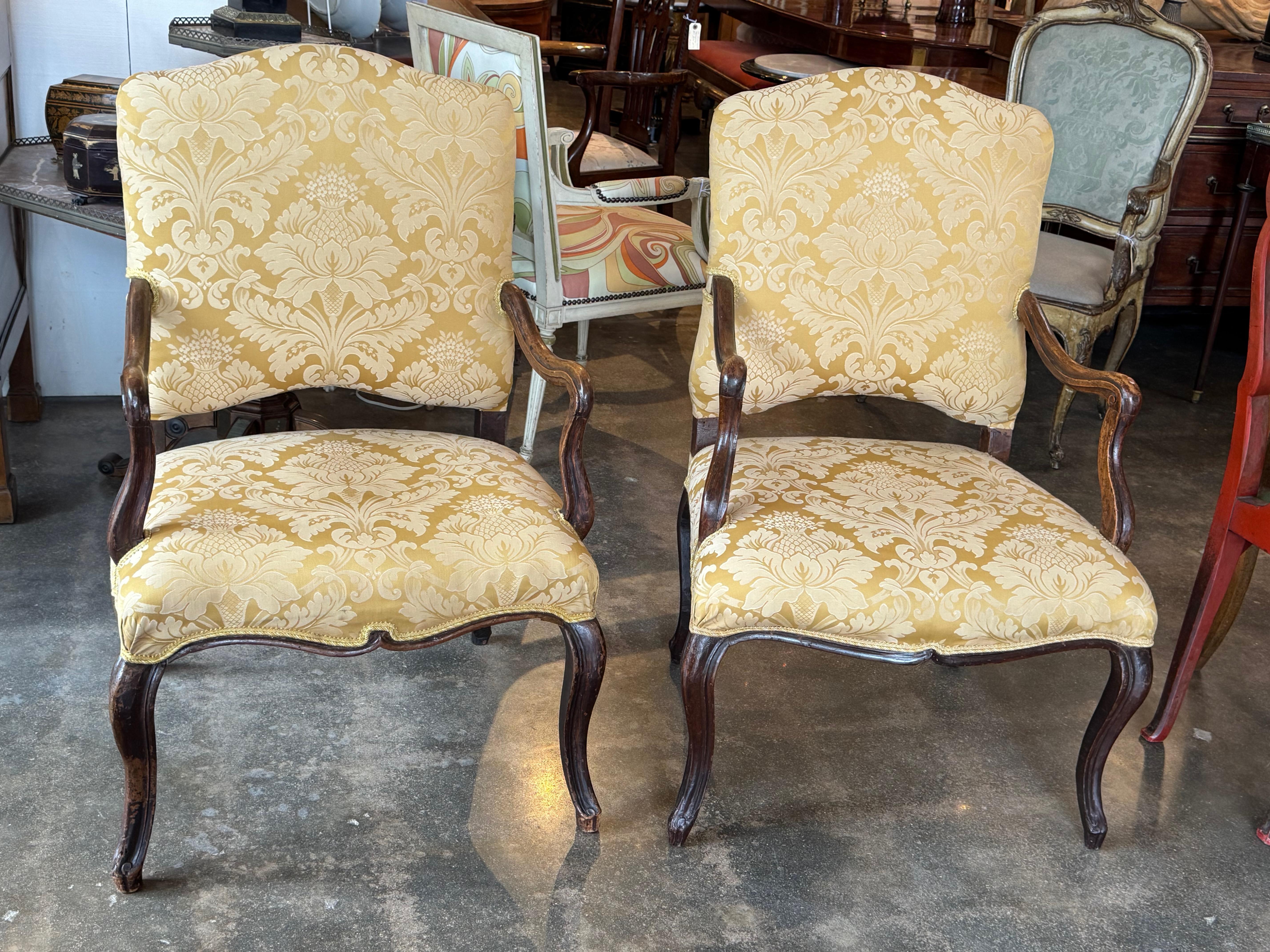 18th Century and Earlier 18th Century Pair of Louis XV Style Fauteuils With Carved Walnut Frames For Sale