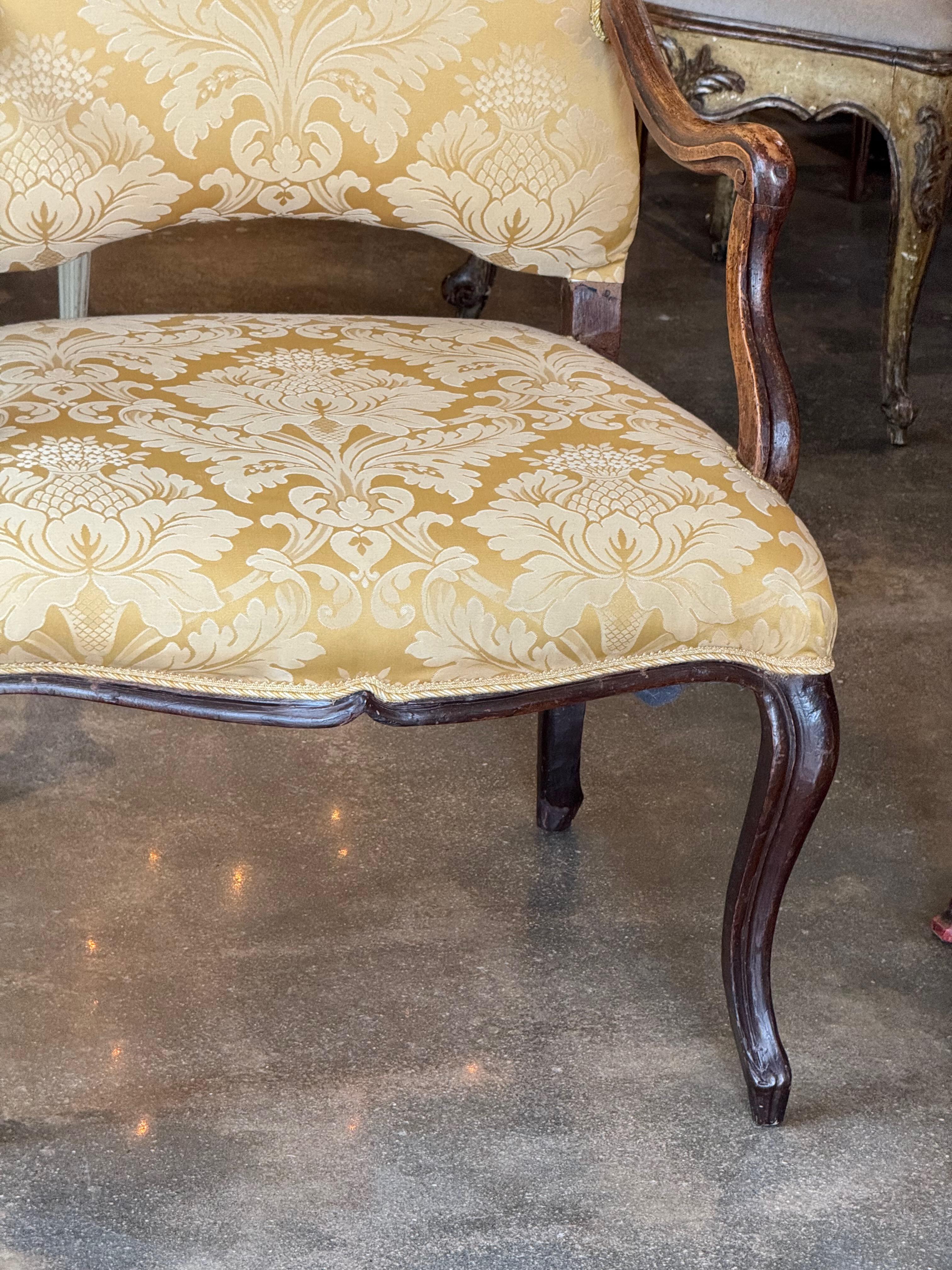 Upholstery 18th Century Pair of Louis XV Style Fauteuils With Carved Walnut Frames For Sale