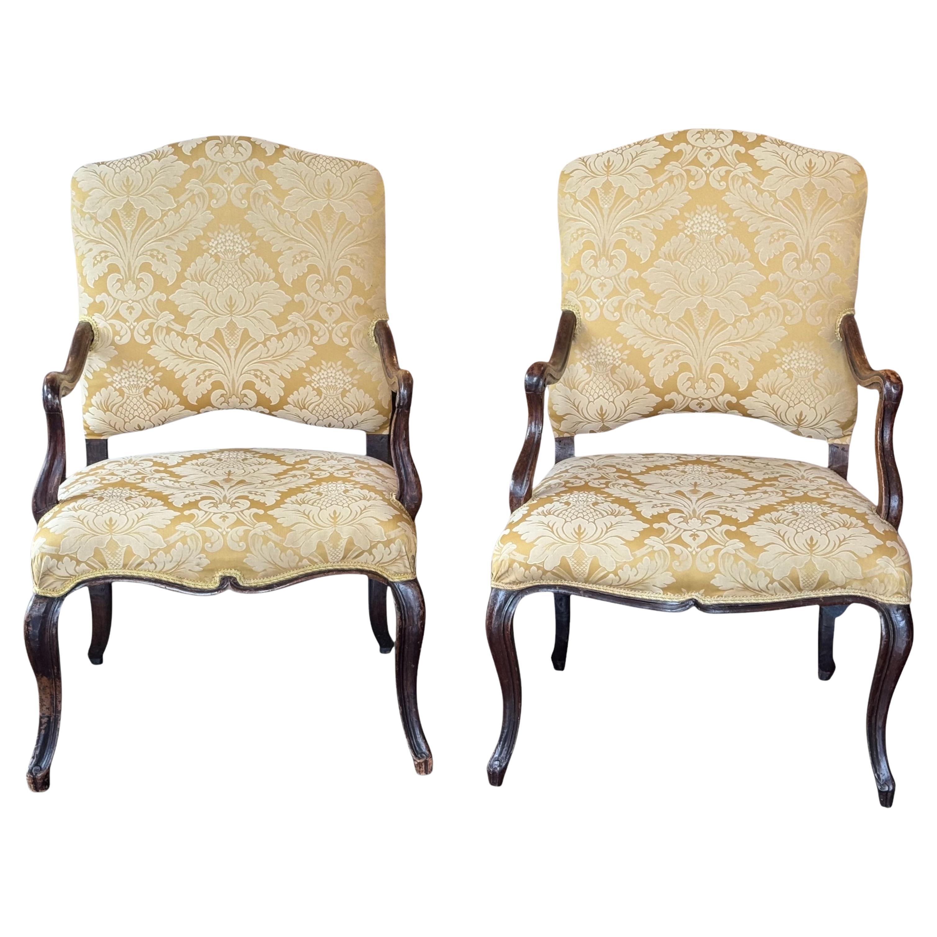 18th Century Pair of Louis XV Style Fauteuils With Carved Walnut Frames For Sale