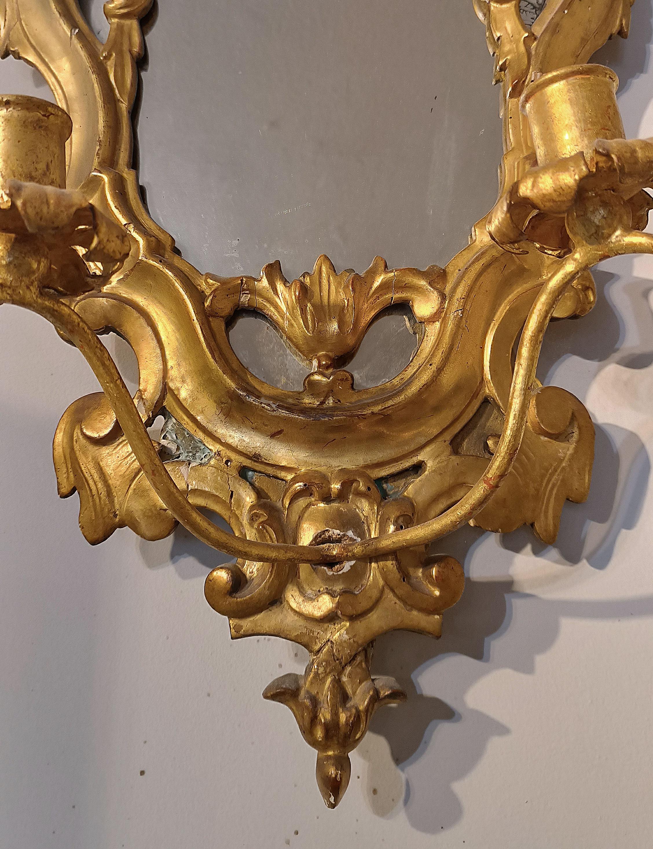 Italian 18th CENTURY PAIR OF SMALL GOLDEN MIRRORS WITH CANDLE HOLDERS For Sale