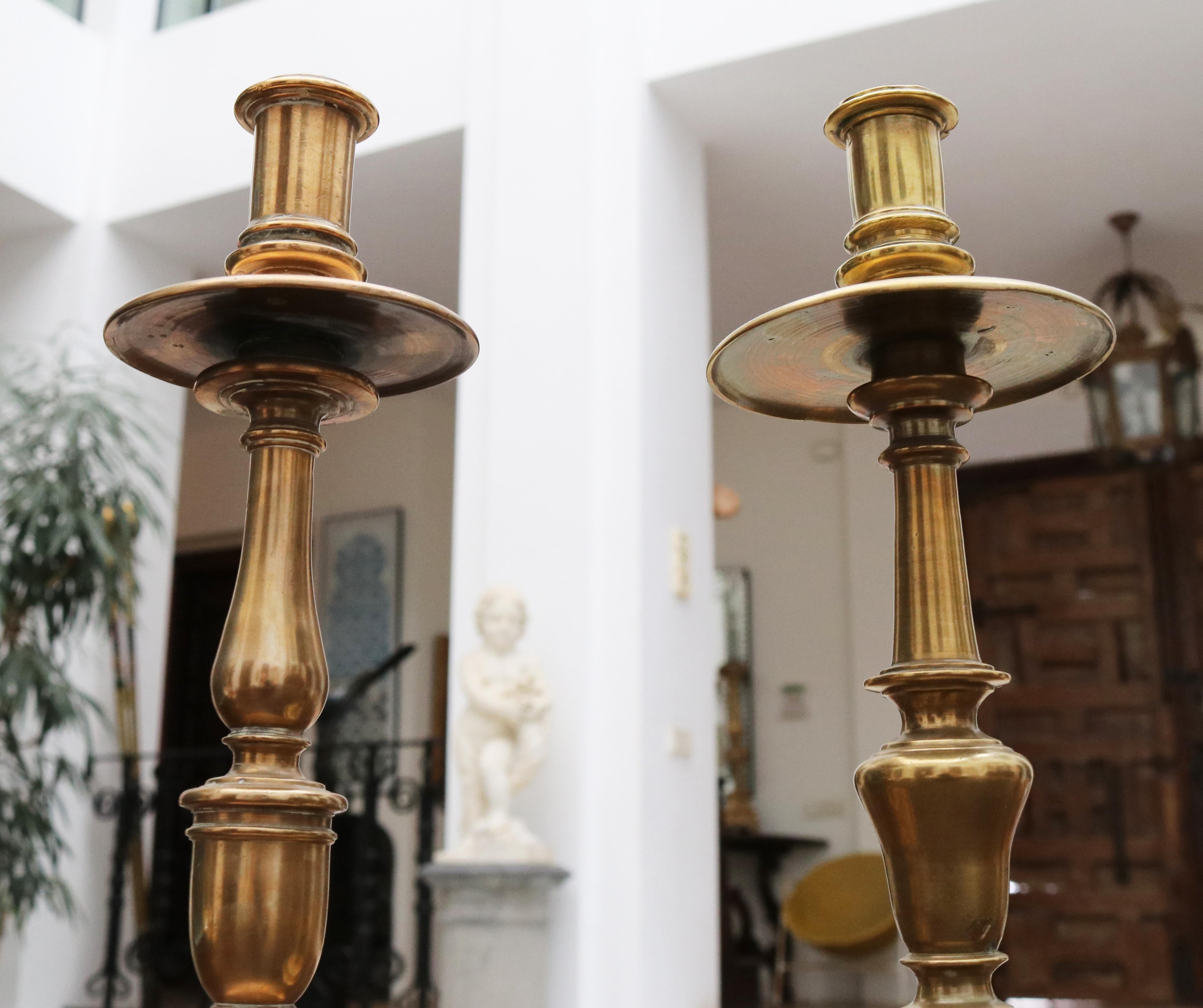 18th century pair of Spanish brass candleholders.
