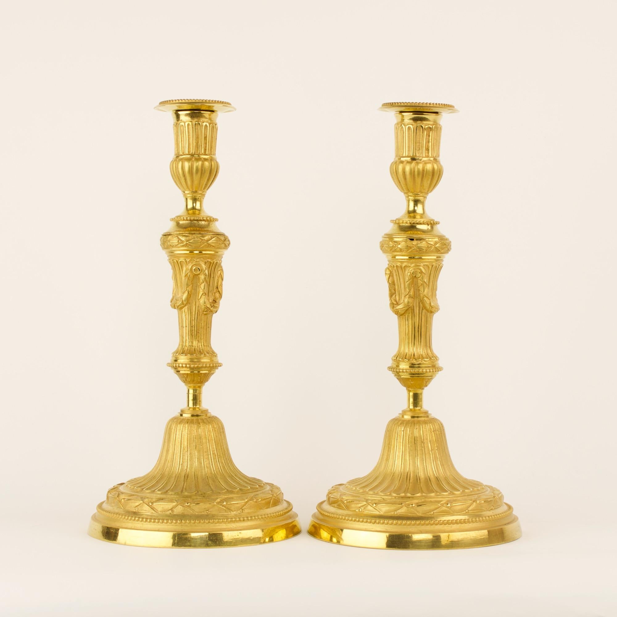 Excellent 18th century pair of Transition Louis XVI gilt bronze candlesticks 