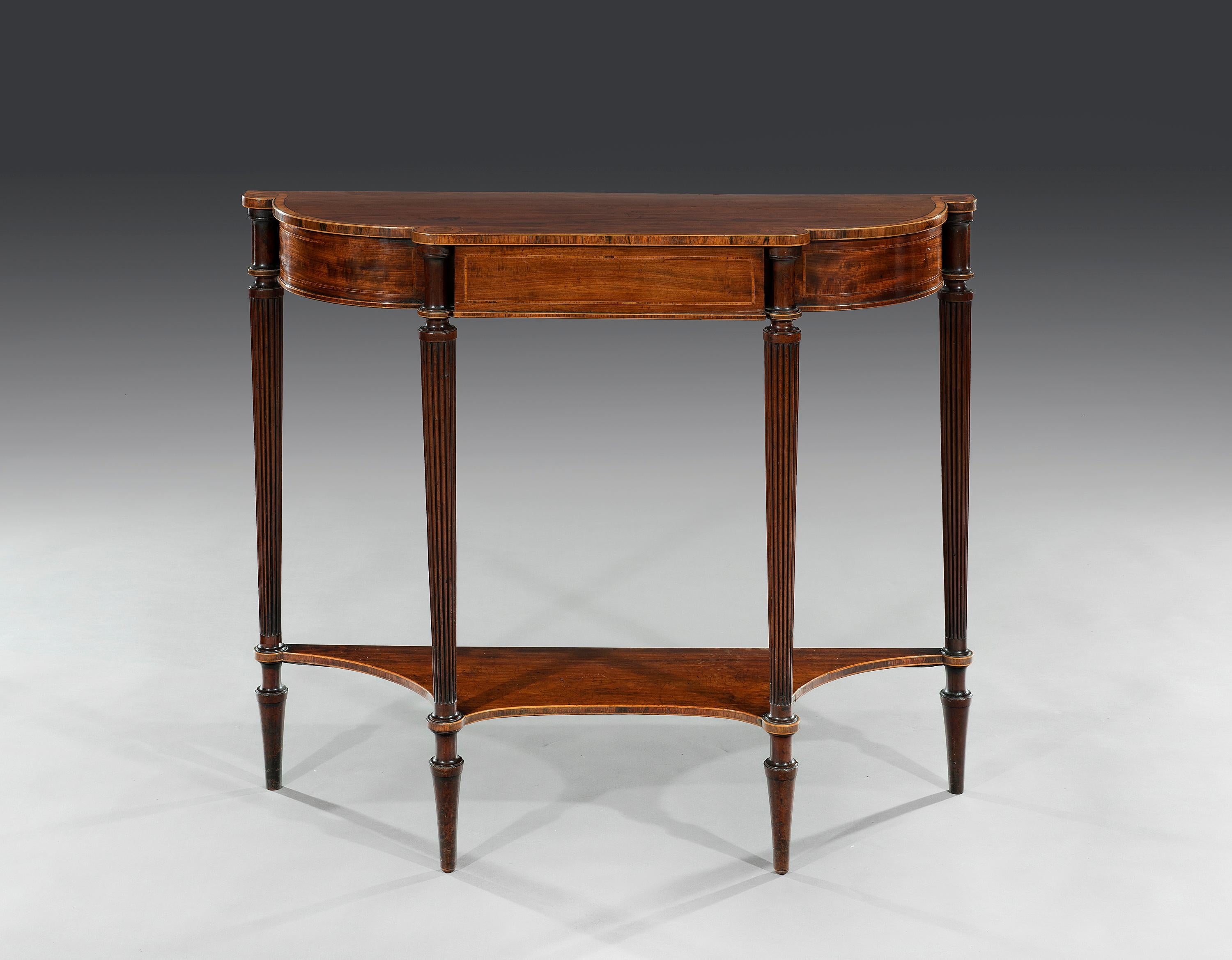 Gillows of Lancaster & London (worked 1730-1903)

George III 18th century period mahogany and rosewood crossbanded demilune pier table
The top is inlaid with satinwood with ebonized lines, the shaped rectangular top with inset roundels to the