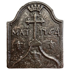 18th Century Polished Iron Fireback with Center Cross and Fleurs-de-Lis Motifs