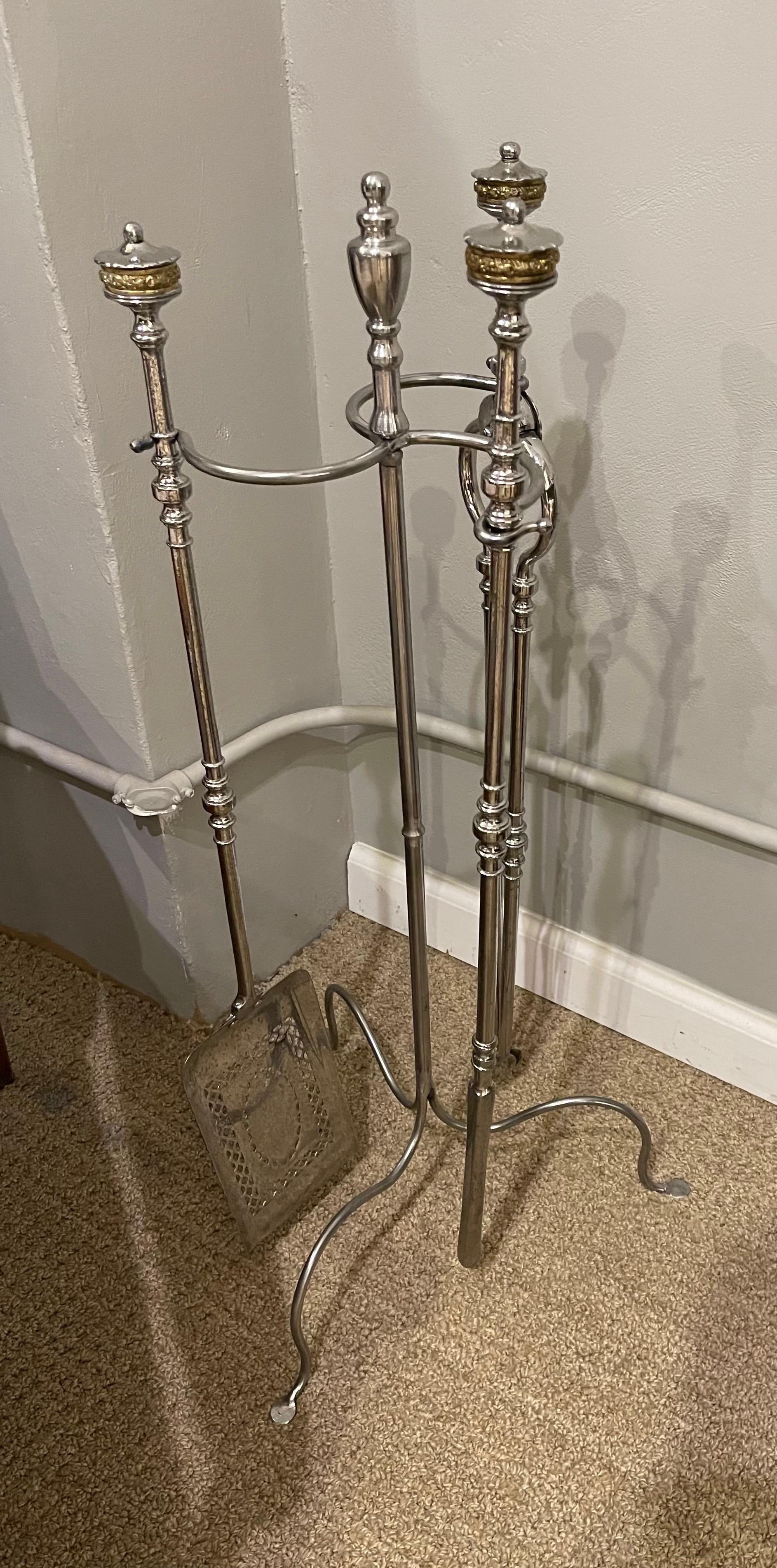 Exceptional set of Polished Steel & Gilt-Metal fire tools on stand. Tongs , shovel & poker
( Stand or a Later date )
Measures: Height: 32 in. (81.28 cm)
Width: 6 in. (15.24 cm)
Depth: 1 in. (2.54 cm).
 