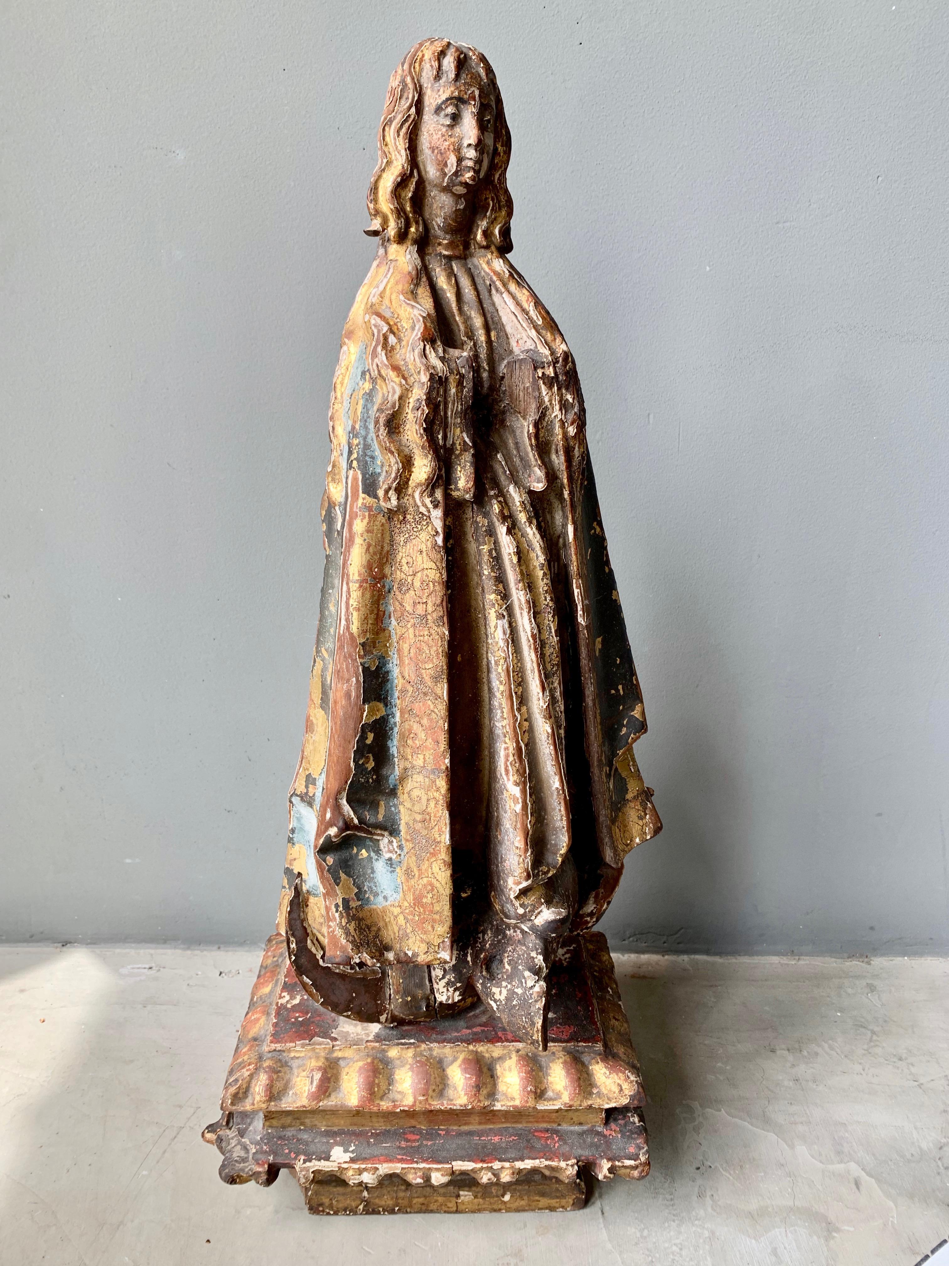 Stunning polychromed wood santo from the early 1700s. Likely from a Roman Catholic Church. Very good condition considering age. Huge amount of presence. Beautiful religious artifact.