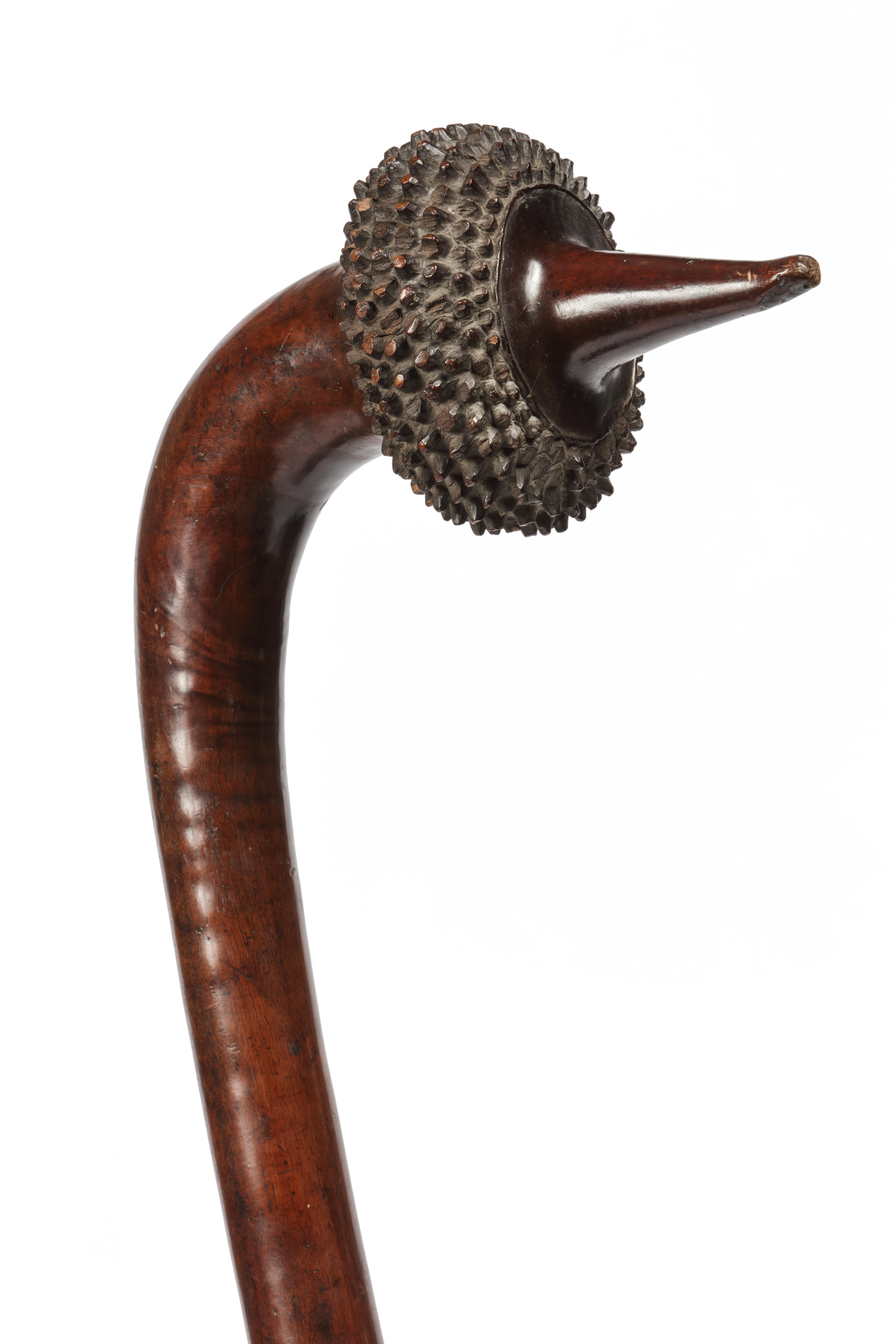 A Polynesian hardwood Totokia, war club or battle hammer 
Fiji, probably 18th century or earlier

Measures: Height. 83 cm

Including museum-quality powder-coated stand.

Provenance:
Private collection, France

The curve in the Totokia