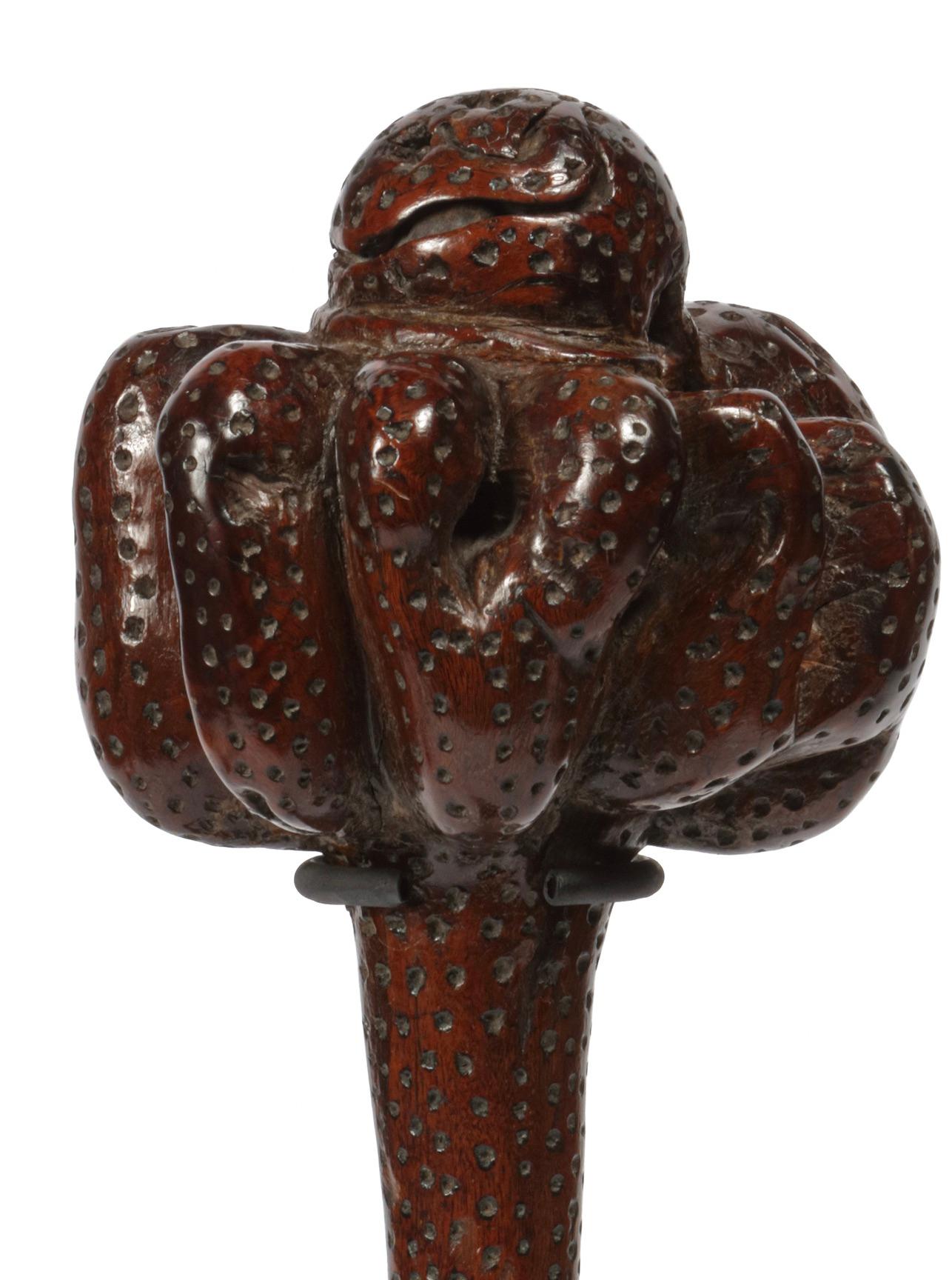 A Polynesian hardwood Ula tavatava or throwing war club
Fiji, probably 18th century

All-over decorated in incised pattern, the bulbous top seems to have a stone grown into it.

H. 42 cm
 
Including museum-quality powder-coated