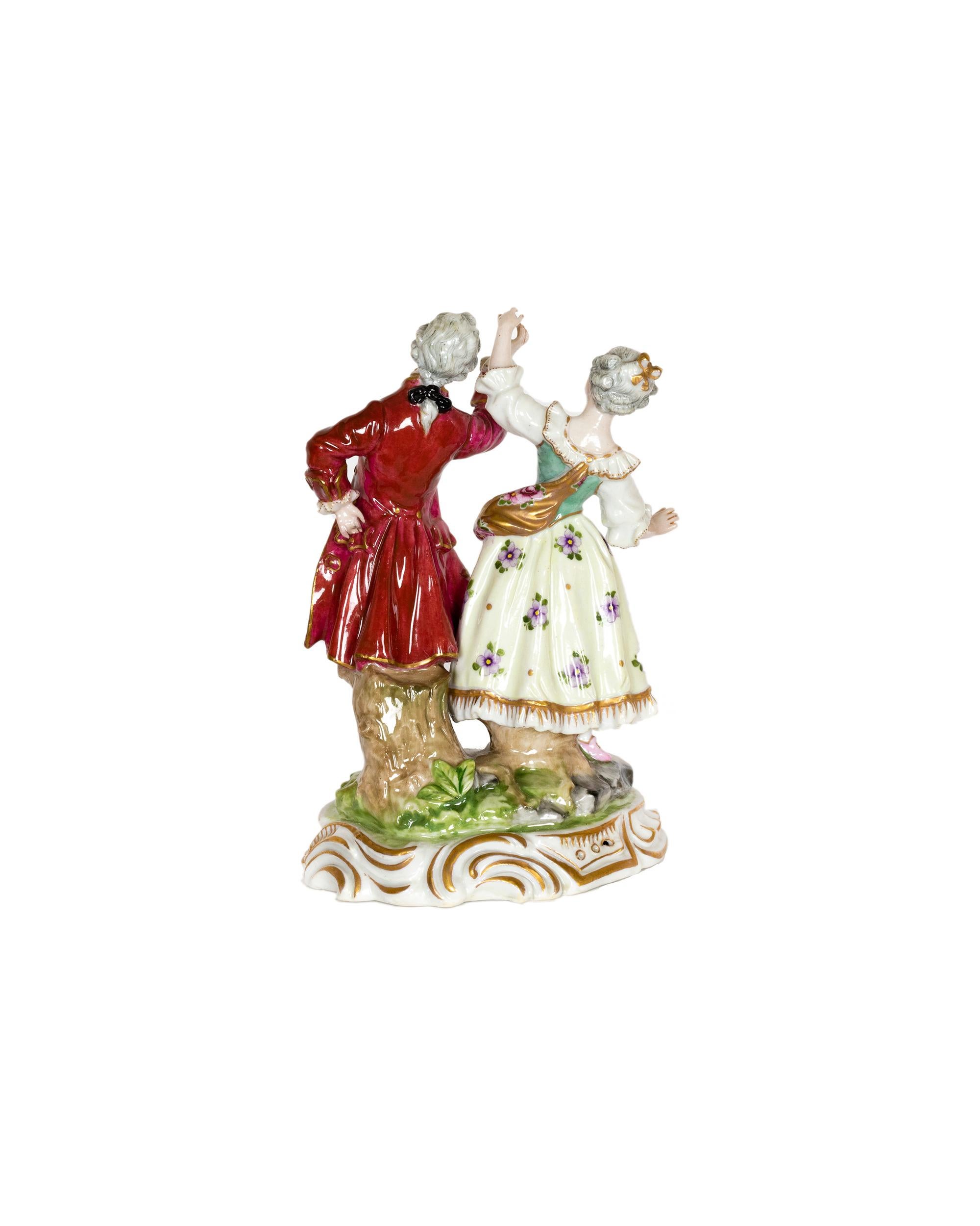 A 18th Century Baroque porcelain dancing couple figurine, crafted by Volkstedt, Muller & Co, Dresden. 

This figure captures the elegance and movement of a refined couple mid-dance, a perfect example of Baroque inspiration in German porcelain