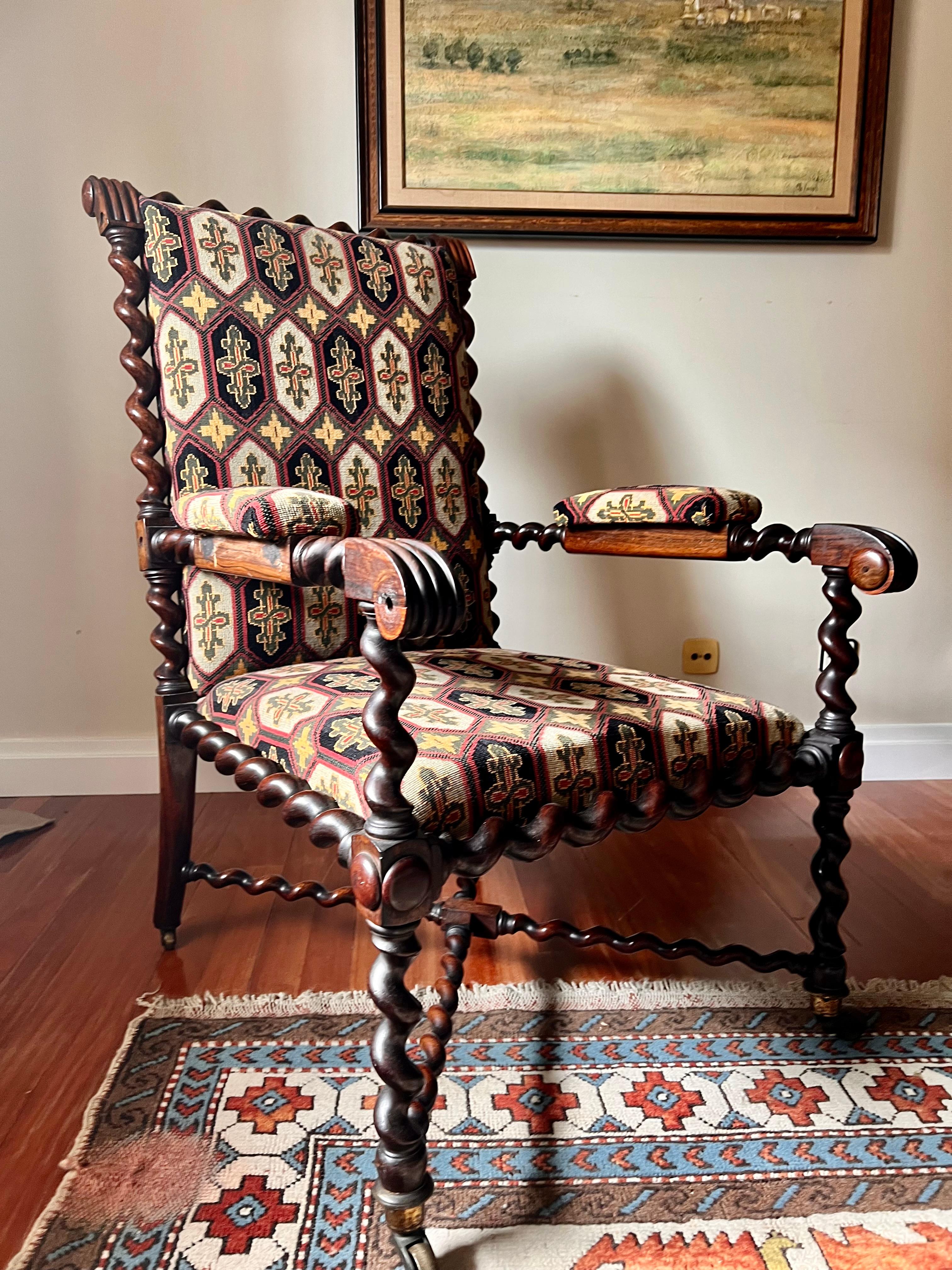 The design and ornamentation of this centre chair is characteristic of Portuguese Baroque furniture dating from the second half of the 18th century. Made from Brazilian rosewood imported from Portugal’s great colony, incorporating tremidos in the