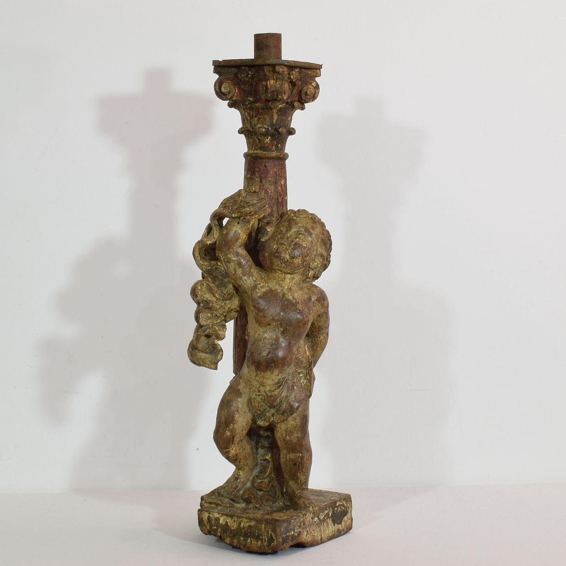 Stunning period piece. Baroque weathered angel with traces of color standing against a column. Candleholder at the top. Very beautiful piece.
Portugal, circa 1750. Weathered, old repairs and small losses. More photo's available on request.

  