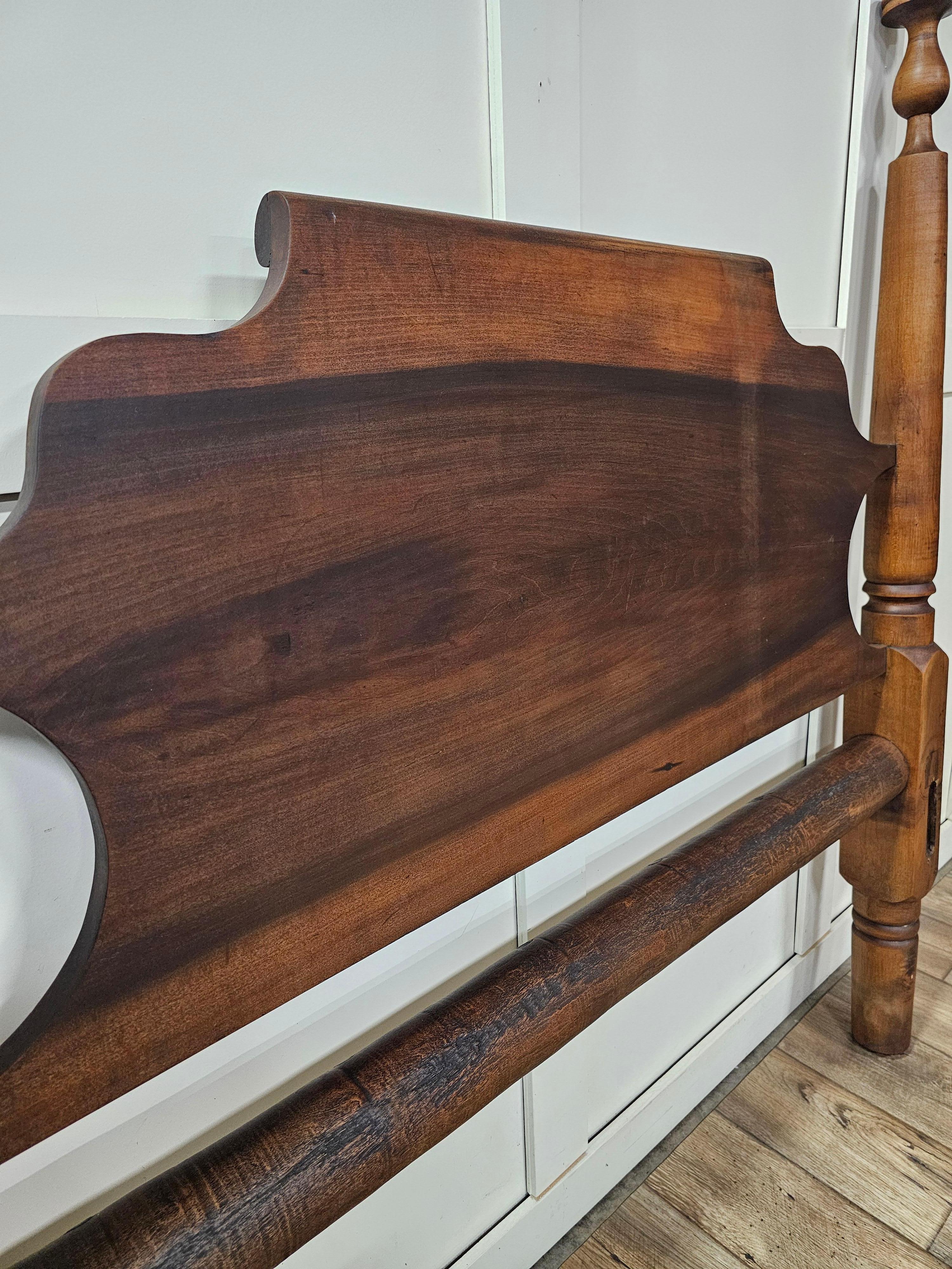 This remarkable circa 1790 walnut rope bed represents a rare and exceptional example of late 18th-century American craftsmanship, likely originating from the Pennsylvania region. Constructed entirely of solid walnut, the bed features exquisite