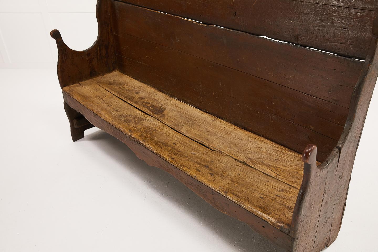 A stunning 18th century primitive bench from the Catalan region of Spain. Nice original paint and patina.