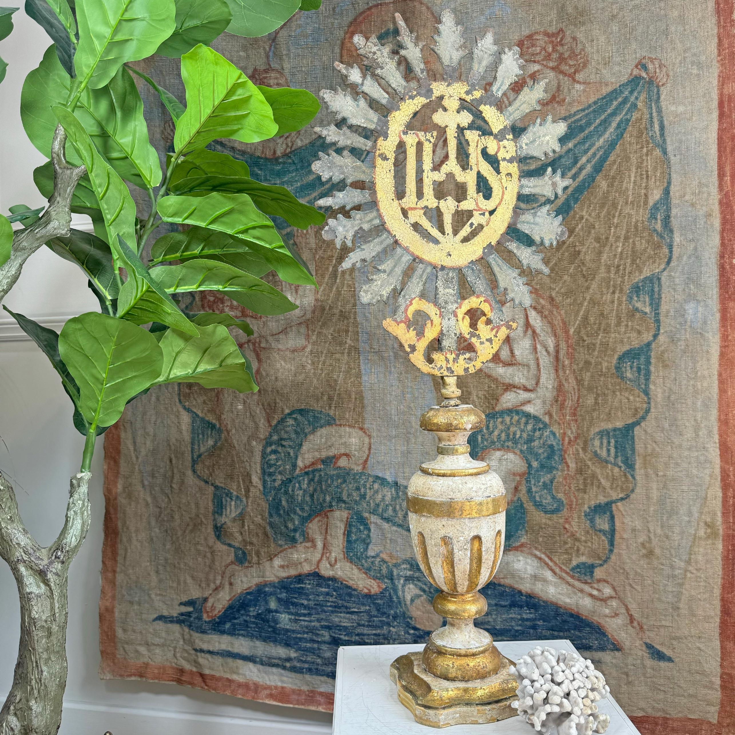 A rare and exceptional 18th century gilt iron processional cross with IHS to the centre, mounted on a magnificent painted gesso, carved wooden altar vase dating to the baroque period, Italian.

A truly special historic religious piece. Wear