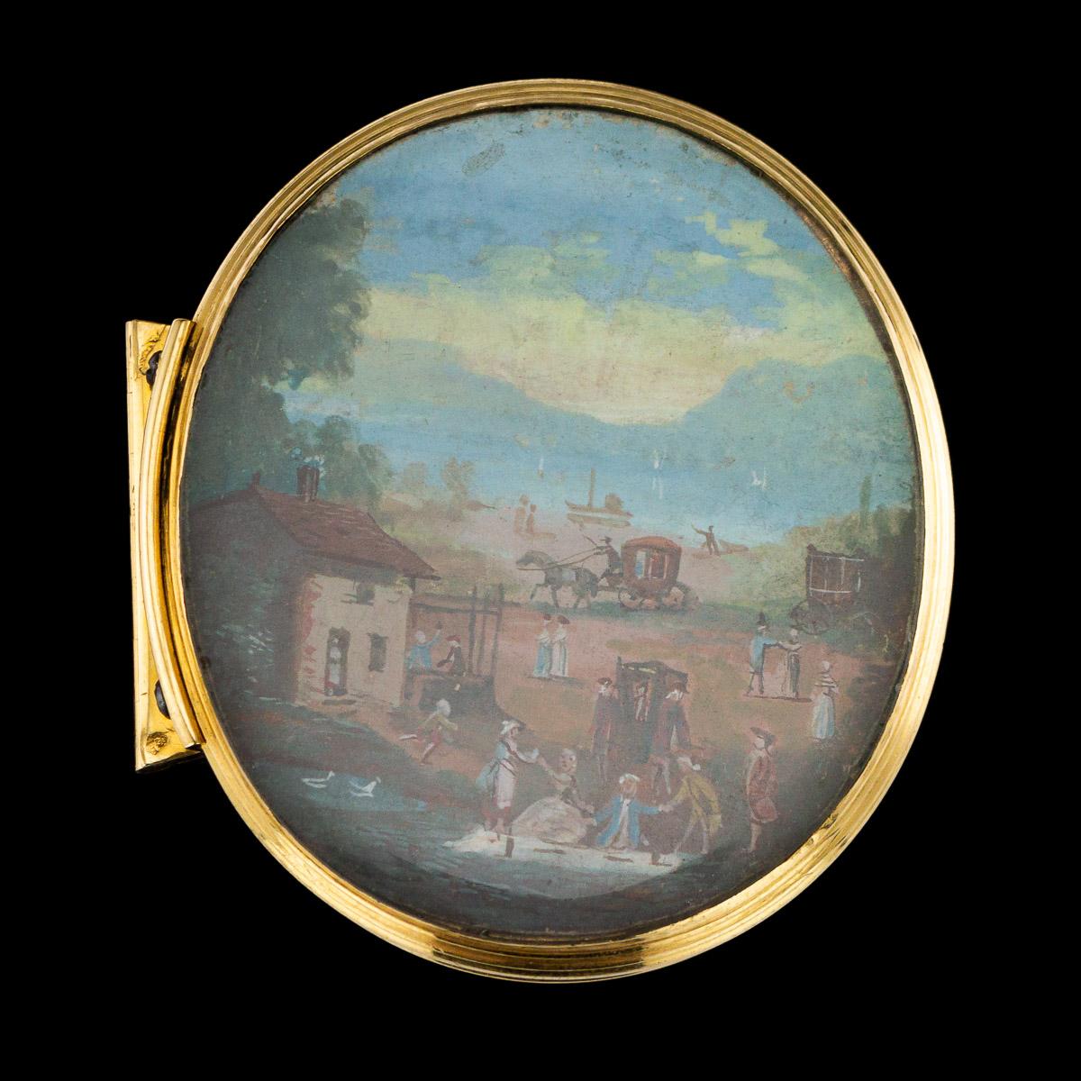 Antique 18th century rare Dutch gold snuff box, of plain oval form with hinged cover, the cover set with a miniature under glass, depicting a Dutch village scene. Hallmarked with Dutch Gold marks, Amsterdam, year 1739 (E), Makers mark Crowned IH,