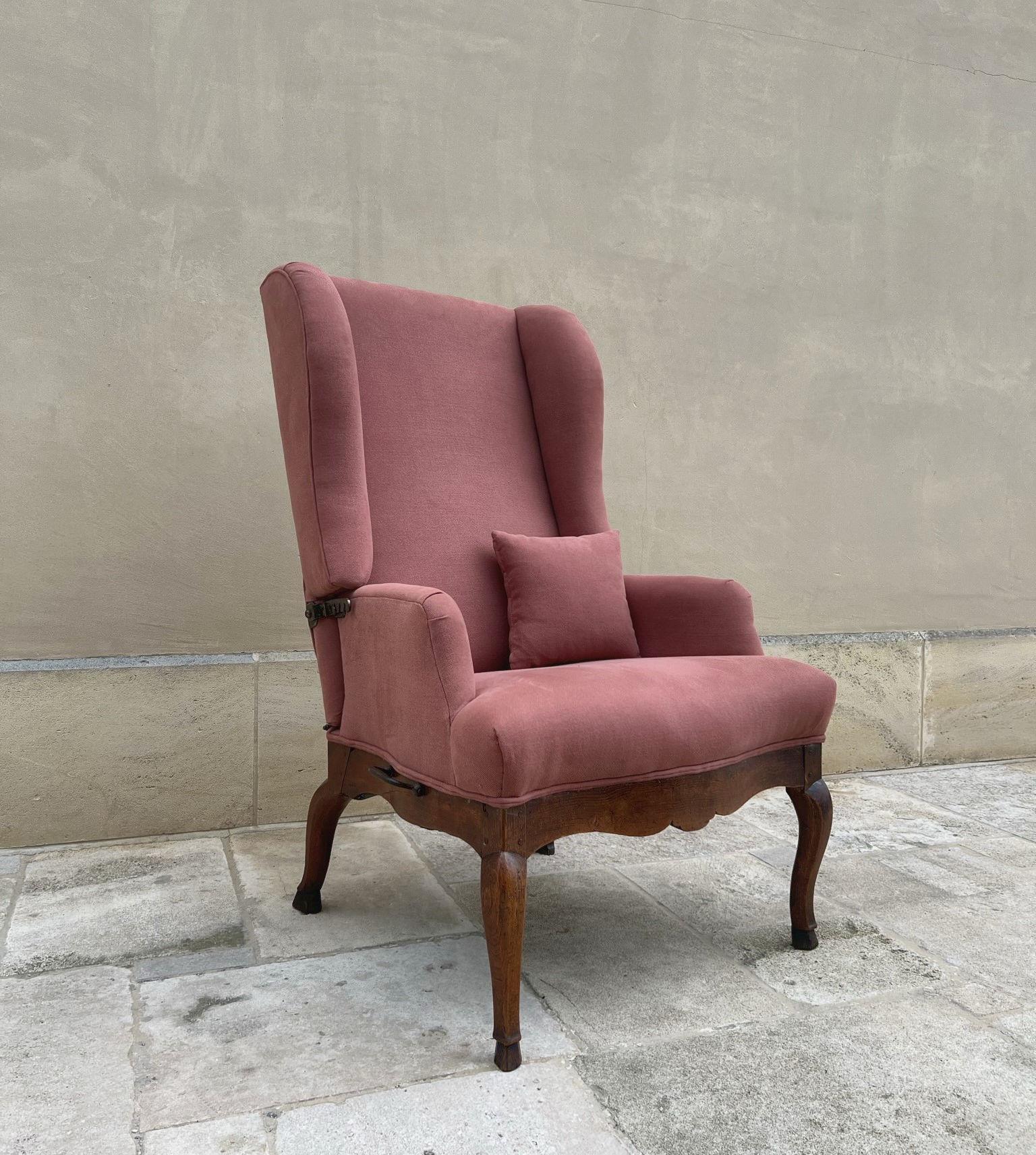 This type of French reclining armchair is also called 'Fauteuil' a Crémallaire, de malade or Molière chair. Crémaillère stands for the iron brackets which make reclining possible, de malade or Molière because they were made to take a nap without