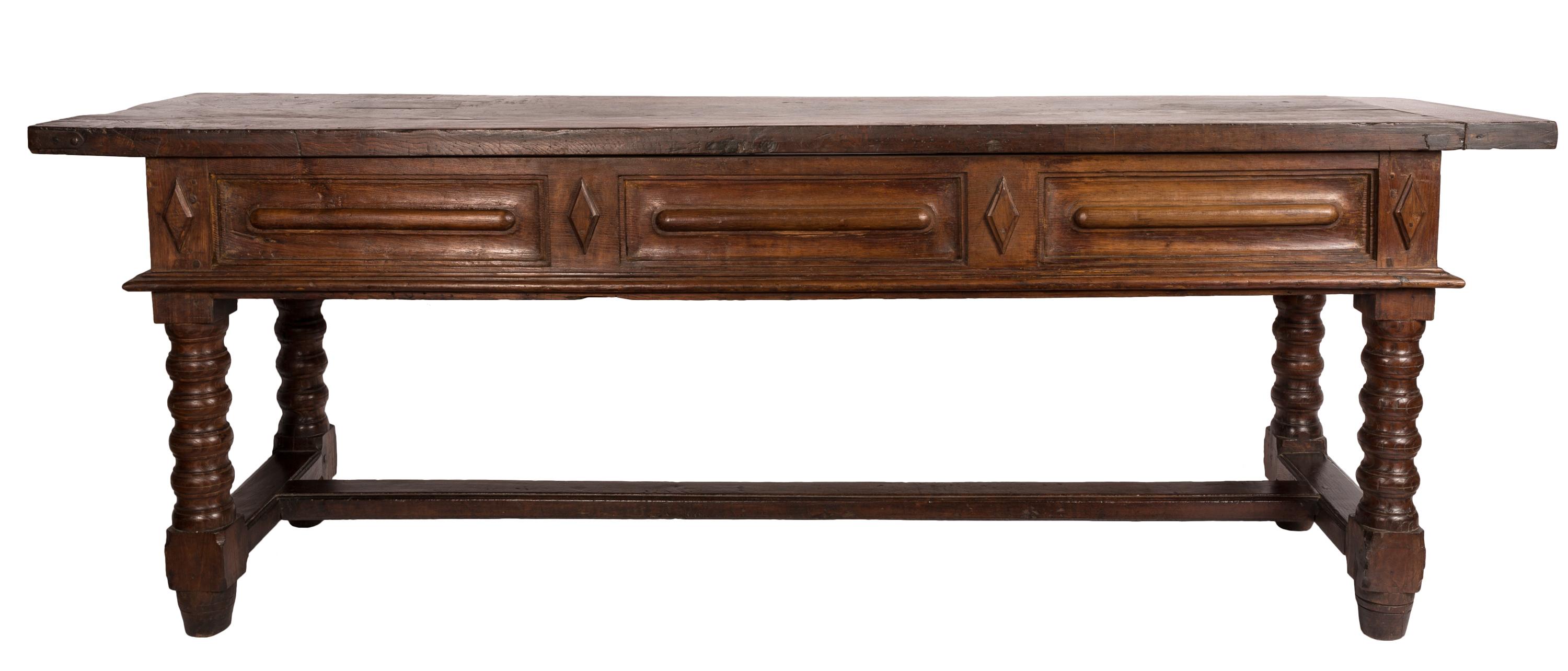 At over 2 meters (7 feet + ) long, this 18th century Spanish refectory table is a dramatic and impressive piece of history. These long and relatively narrow refectory tables were originally used in the dining halls (refectories) of medieval