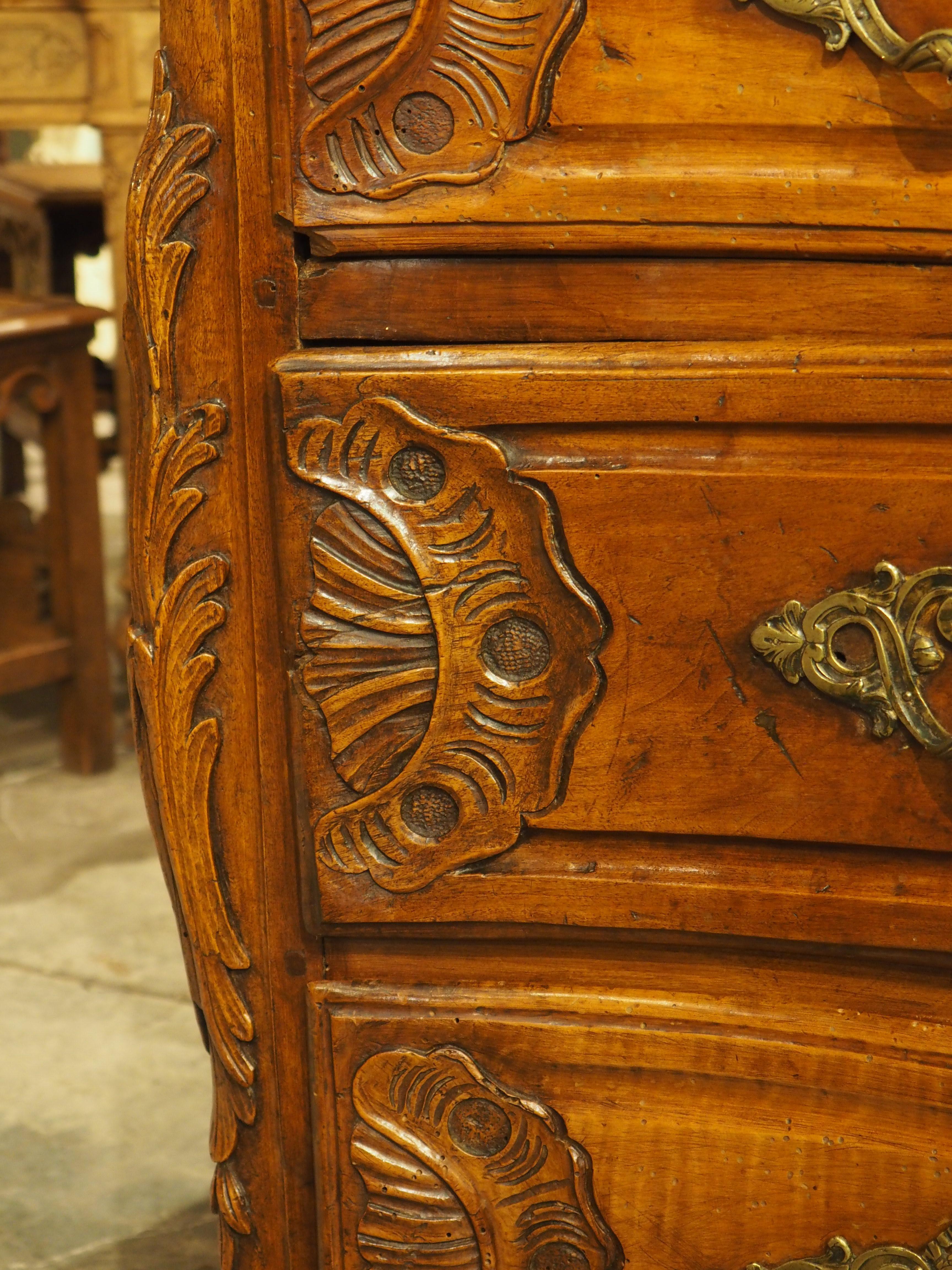 Metal 18th Century Regence Period Carved Walnut Lyonnaise Commode 'Arbalete' For Sale