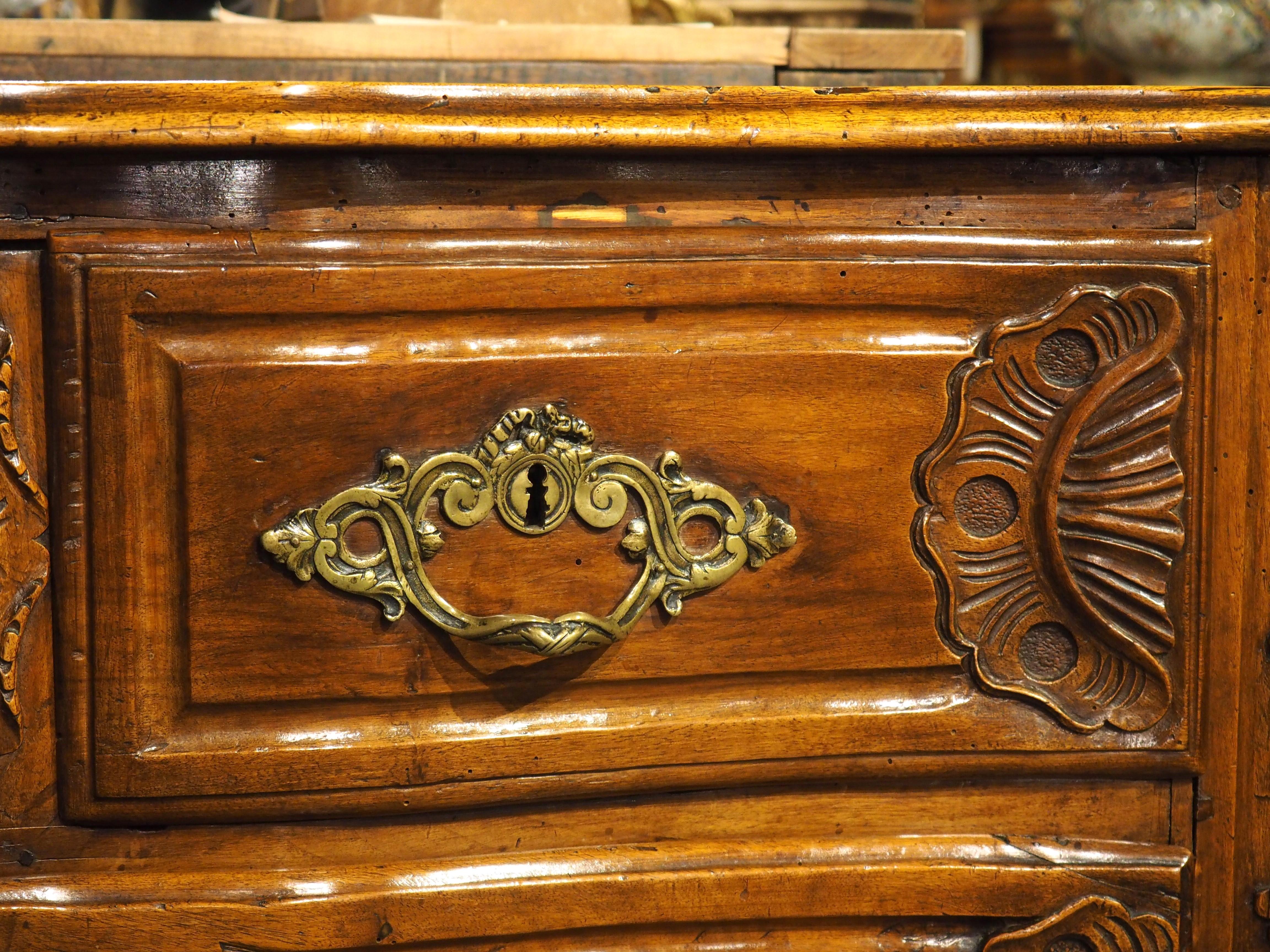 18th Century Regence Period Carved Walnut Lyonnaise Commode 'Arbalete' For Sale 2