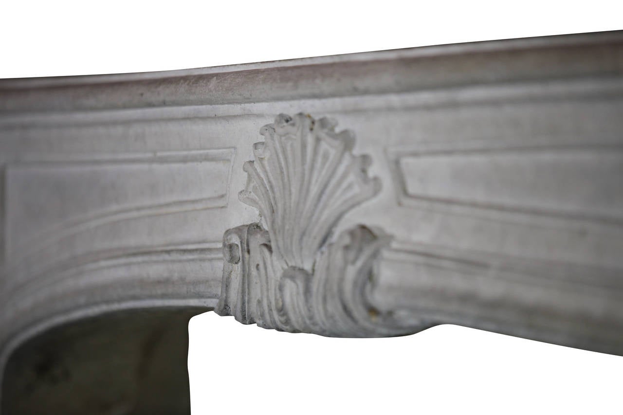 Carved Antique French Classic Limestone Fireplace Mantel For Sale